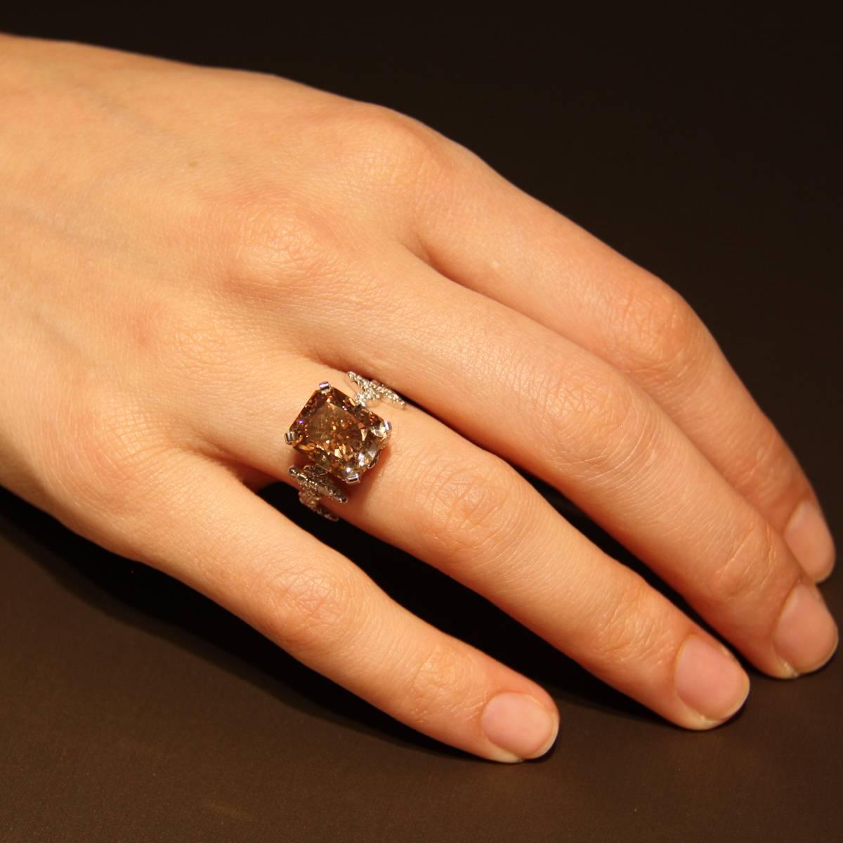 This exceptional Fancy Orange Brown Diamond Solitaire Ring is a must have, part of the Heartbeat Collection of Lorenz Bäumer. The paved pink gold Solitaire Ring is surmounted by a wonderful GIA Certified 7.03 VS2 Fancy Orange Brown Diamond. The ring