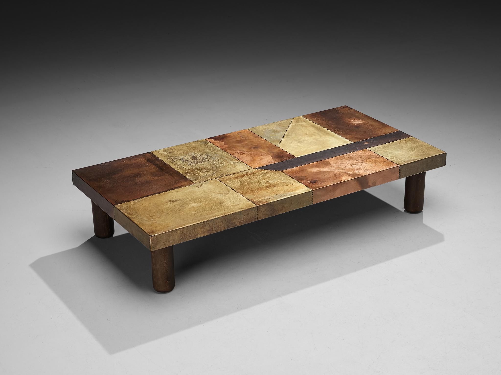 Lorenzo Burchiellaro, coffee table, copper and wood, Italy, 1960s.

This coffee table is an absolute eye-catcher. The copper is in beautiful, patinated condition and the vibrant yet natural oxidation and golden color is something out of this world.