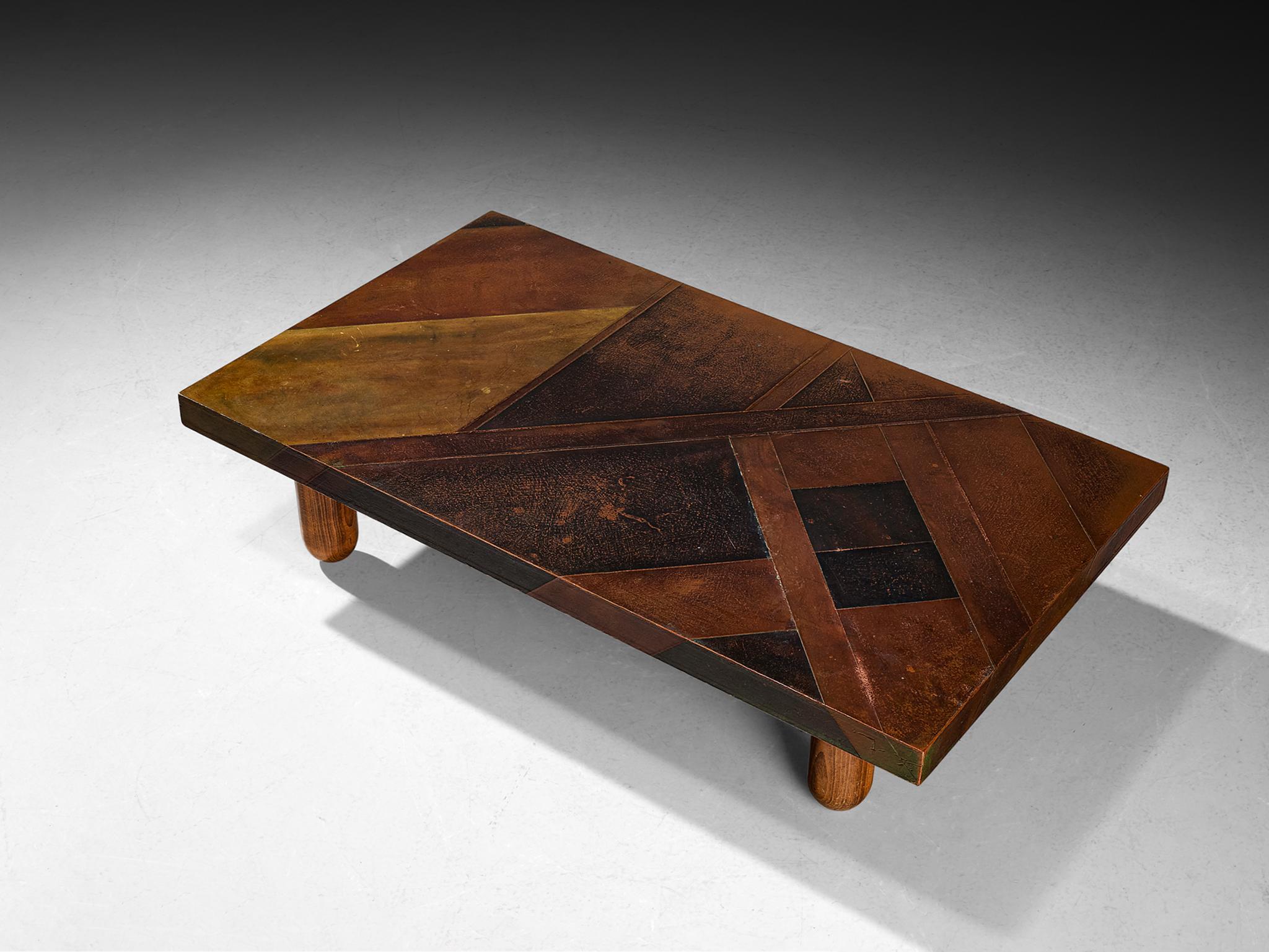 Lorenzo Burchiellaro, coffee table, copper and stained beech, Italy, 1960s.

This coffee table is an absolute eye-catcher. The copper is in beautiful, patinated condition and the vibrant yet natural oxidation and bronze color is something out of