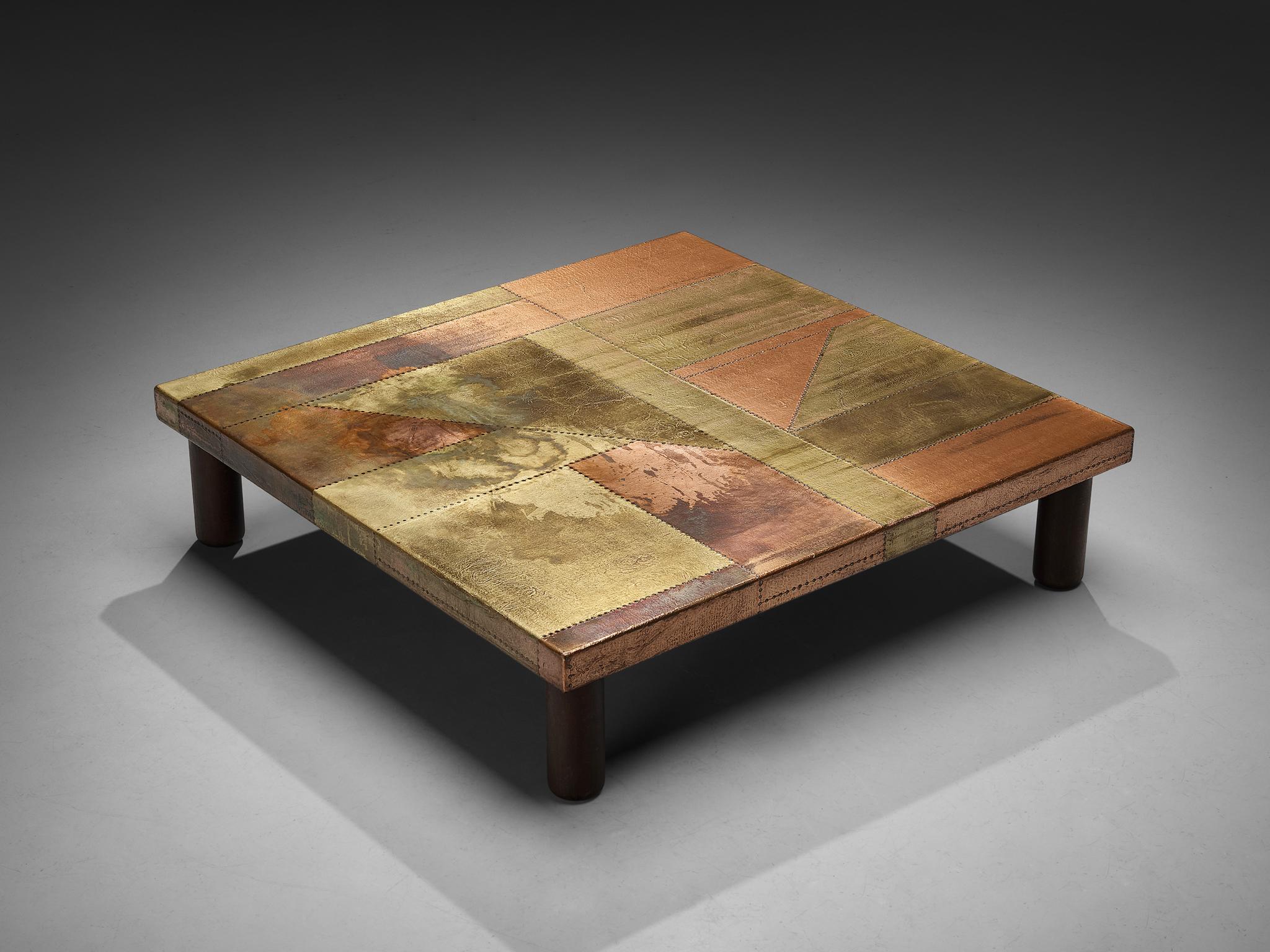 Lorenzo Burchiellaro, coffee table, copper and wood, Italy, 1960s.

This coffee table is an absolute eye-catcher. The copper is in beautiful, patinated condition and the vibrant yet natural oxidation and golden color is something out of this world.