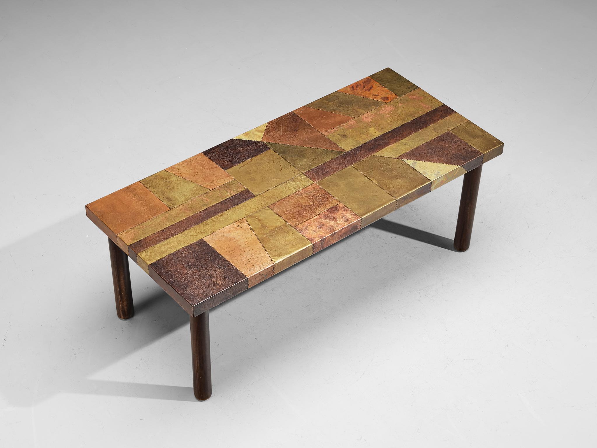Lorenzo Burchiellaro, dining or center table, copper, stained beech, Italy, 1960s

This magnificent dining table is created by Italian designer and sculptor Lorenzo Burchiellaro (1933-2017) in the 1960s. The copper is in beautiful, patinated