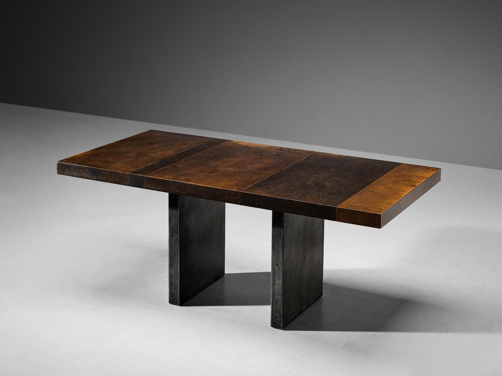 Lorenzo Burchiellaro, dining table, copper and coated wood, Italy, 1970s.

This table is an absolute eye-catcher. The copper is in beautiful, patinated condition and the vibrant yet natural oxidation and golden color is something out of this world.