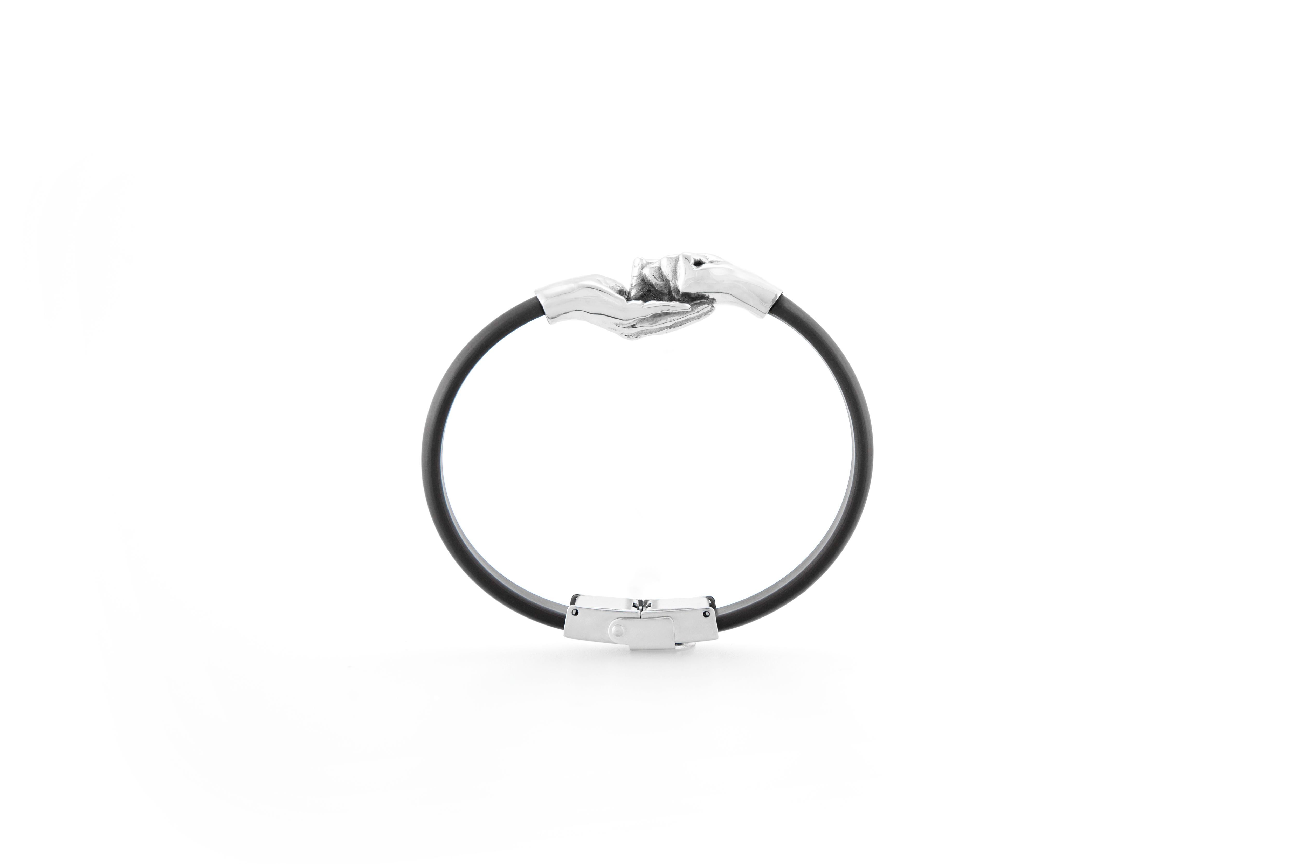 Silver and Rubber bracelet from the Give & Receive collection by Lorenzo Quinn.
Available in 16 vibrant colours, please request your personal favourite.
Also available in double twist bracelet, see another listing.

Inspiration
