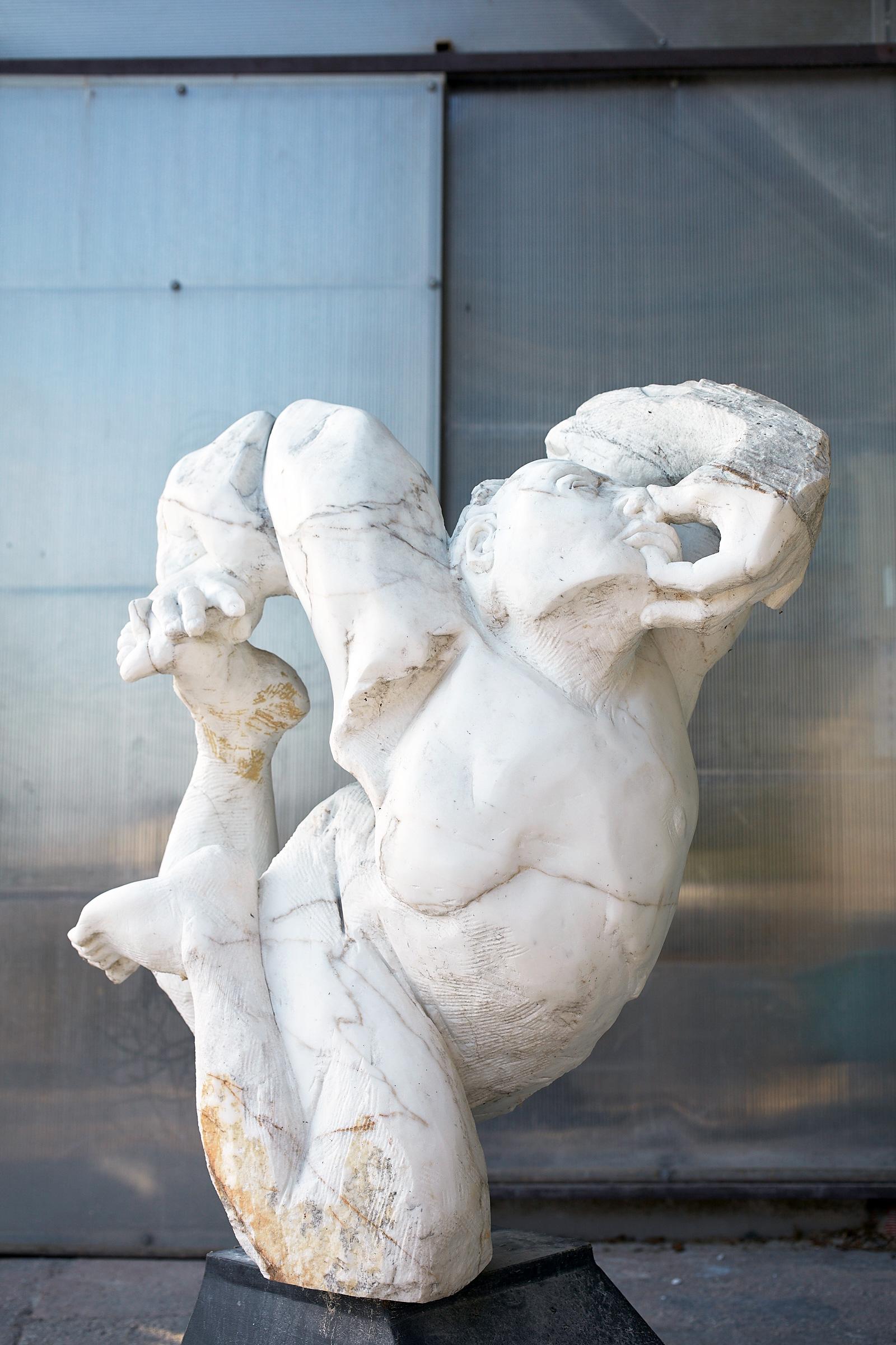 striking hand carved Carrara marble sculpture by contemporary Italian sculptor Lorenzo Vignoli, incorporating classical references and contemporary Mediterranean influences

CONTORSIONISTA by Lorenzo Vignoli (2003)
Carrara, Italy

hand carved