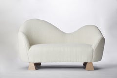 Lorette Settee, Ivory Bouclé & Natural Wood Settee by Christian Siriano