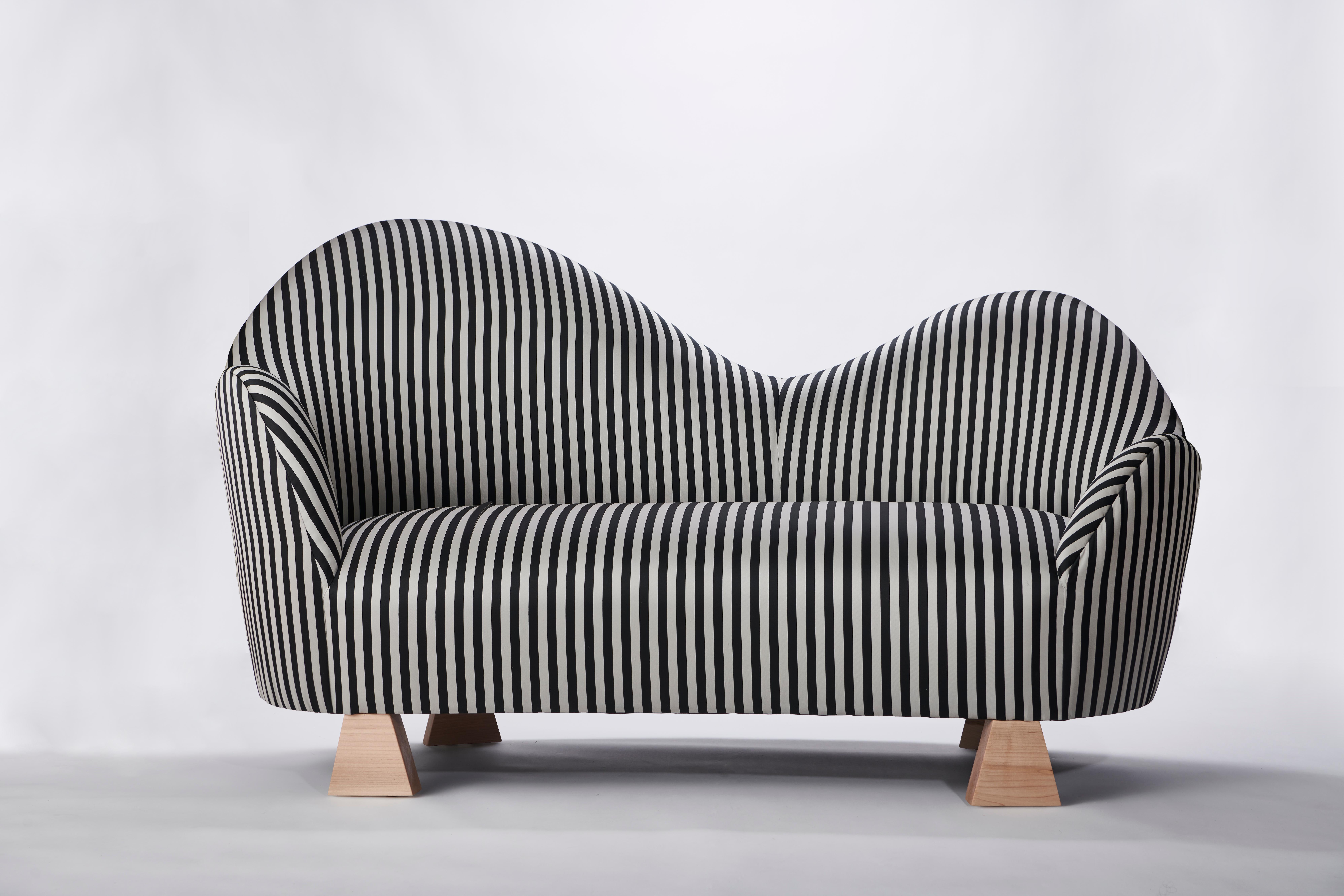 Made to order silk and wood settee designed by Christian Siriano.

Fabric: Black/grey stripe silk (available in custom fabric)
Base: Natural Maple (available in custom finish)
 
Dimensions: 
Overall Width: 64”
Overall Depth: 30” 
Overall Height: