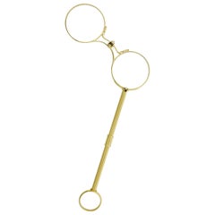 Lorgnette in 18 Karat Yellow Gold circa 1900 with Spring Action