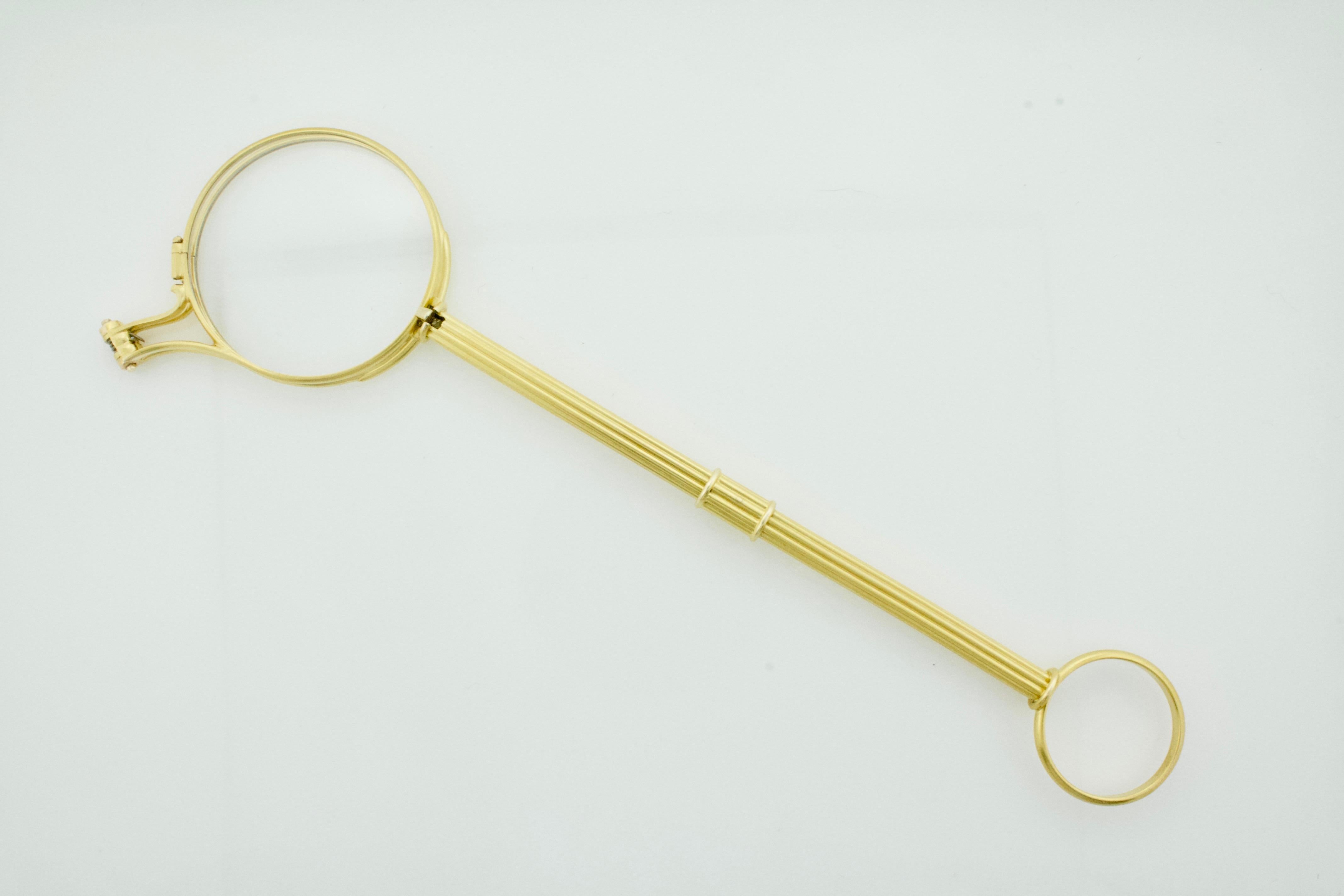 Lorgnette in 18k Yellow Gold Circa 1900 With Spring Action 
When The Jones's Pull Out Their Readers You Spring This Lorgnette Open and Win!
The Lenses Can Be Changed By Your Optometrist To Fit Your Eyes 
61/2 Inches In Length 
The Video Was Shot in