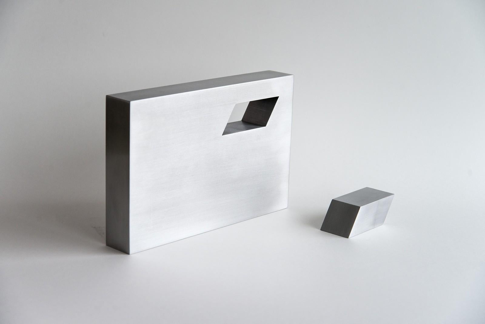 Lori Cozen-Geller Abstract Sculpture - Silver Shadow - small, smooth surfaced, brushed aluminum, abstract sculpture