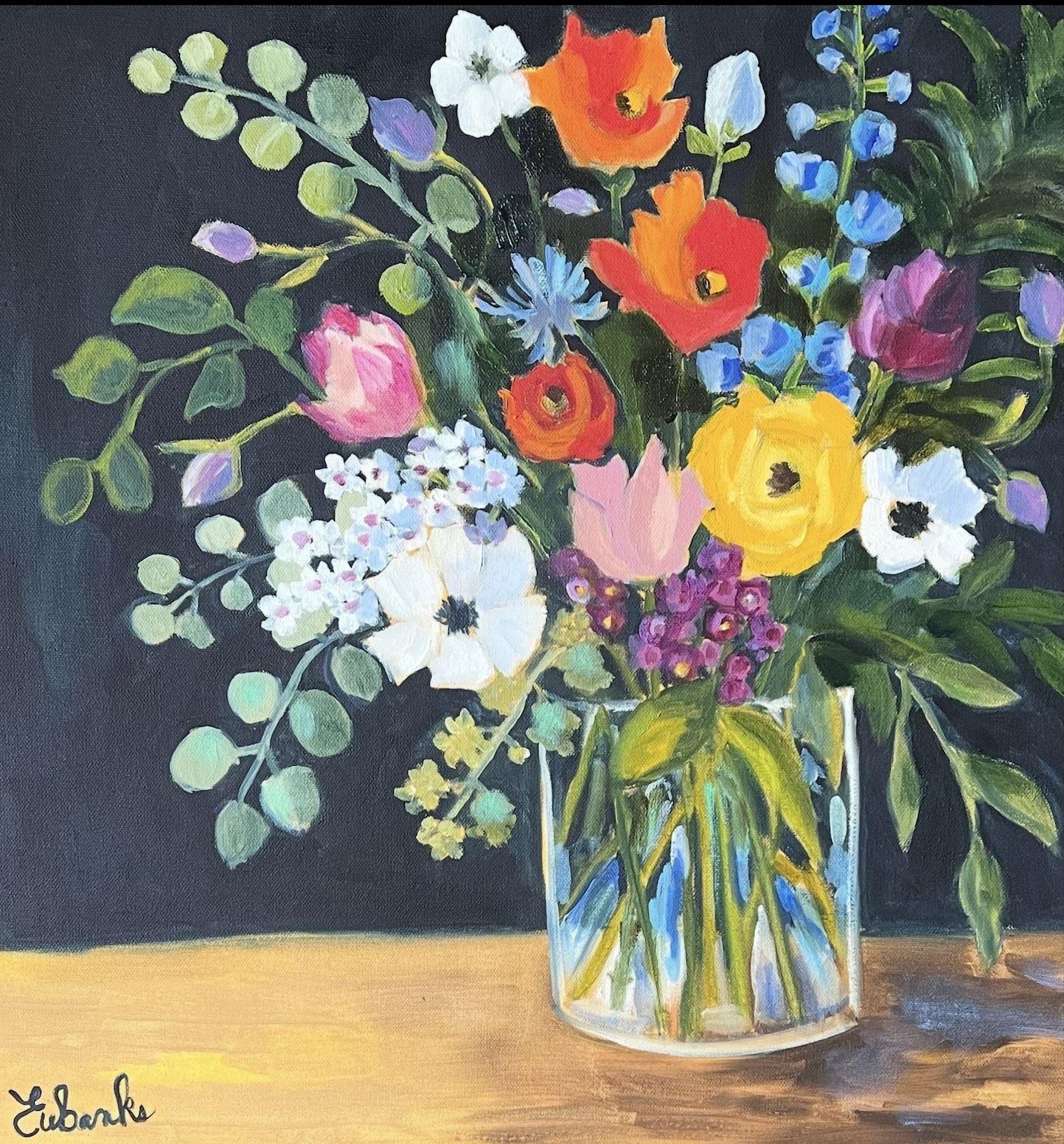 "For Your Special Day" di Lori Eubanks è un dipinto a olio su tela 20x20 che raffigura un colorato bouquet floreale in un vaso di cristallo con un assortimento di fiori su uno sfondo blu intenso. L'elevato contrasto tra i fiori e lo sfondo crea un