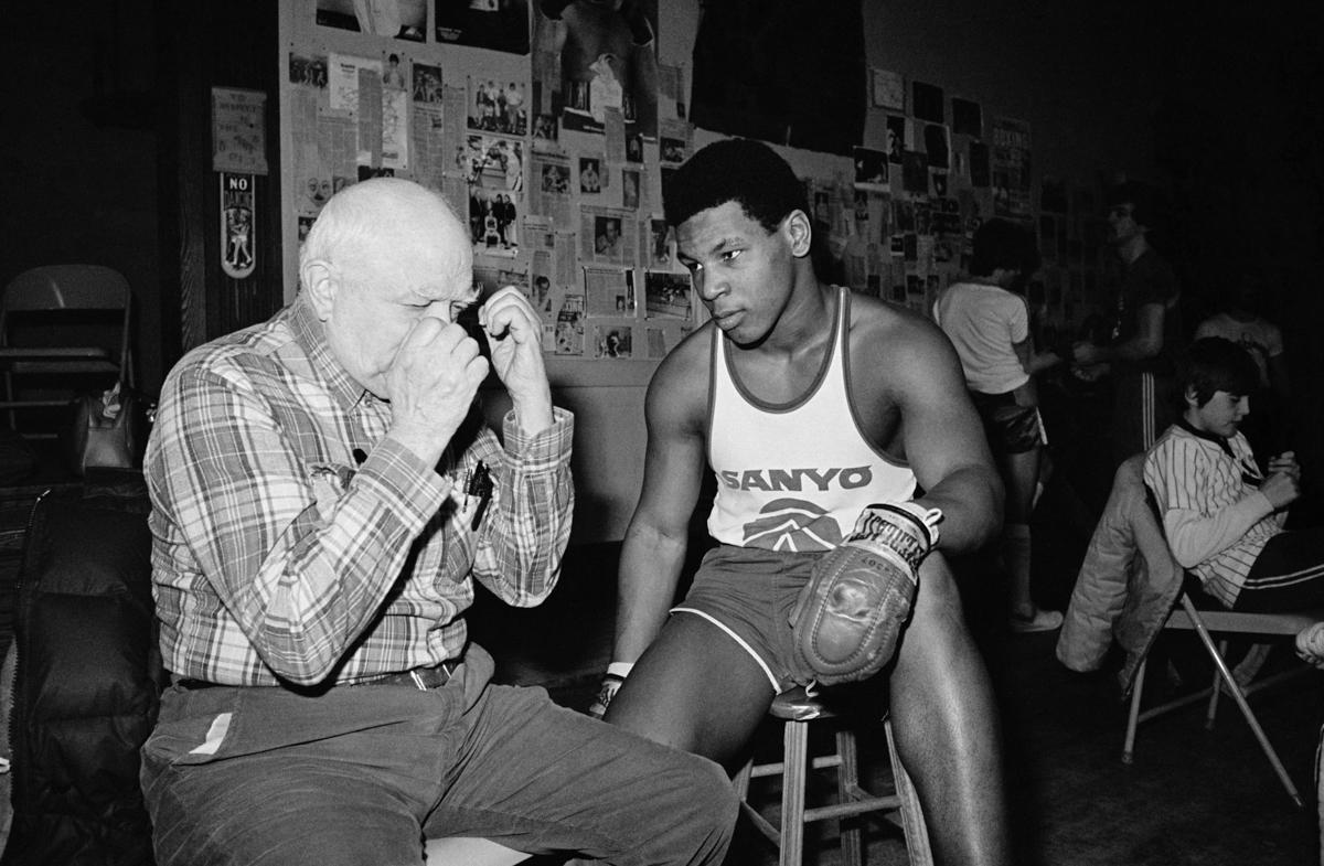 Untitled (D’Amato and Tyson) [Cus D’Amato demonstrates his peek-a-boo style] - Photograph by Lori Grinker