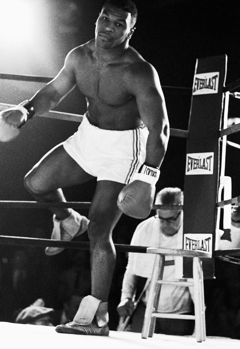 Lori Grinker Portrait Photograph - Untitled (Mike Tyson enters the ring. . .)