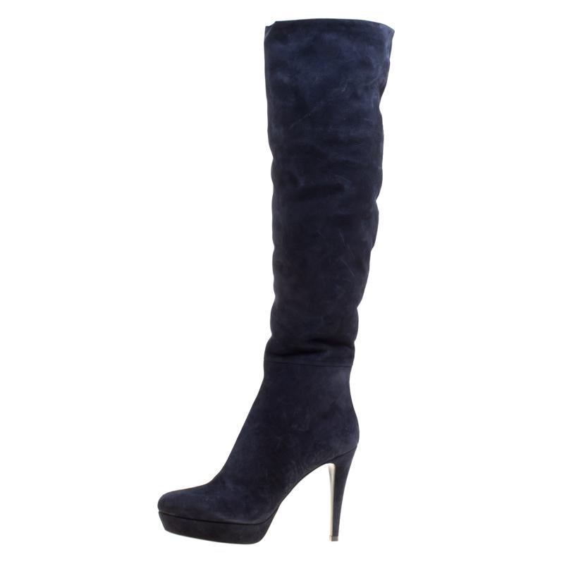 Simple and sophisticated, these over the knee boots from Loriblu are a must-buy for the fashionable you. These navy blue boots are crafted from suede and come with a leather lined insole. Featuring stiletto heels and solid platforms, they can be