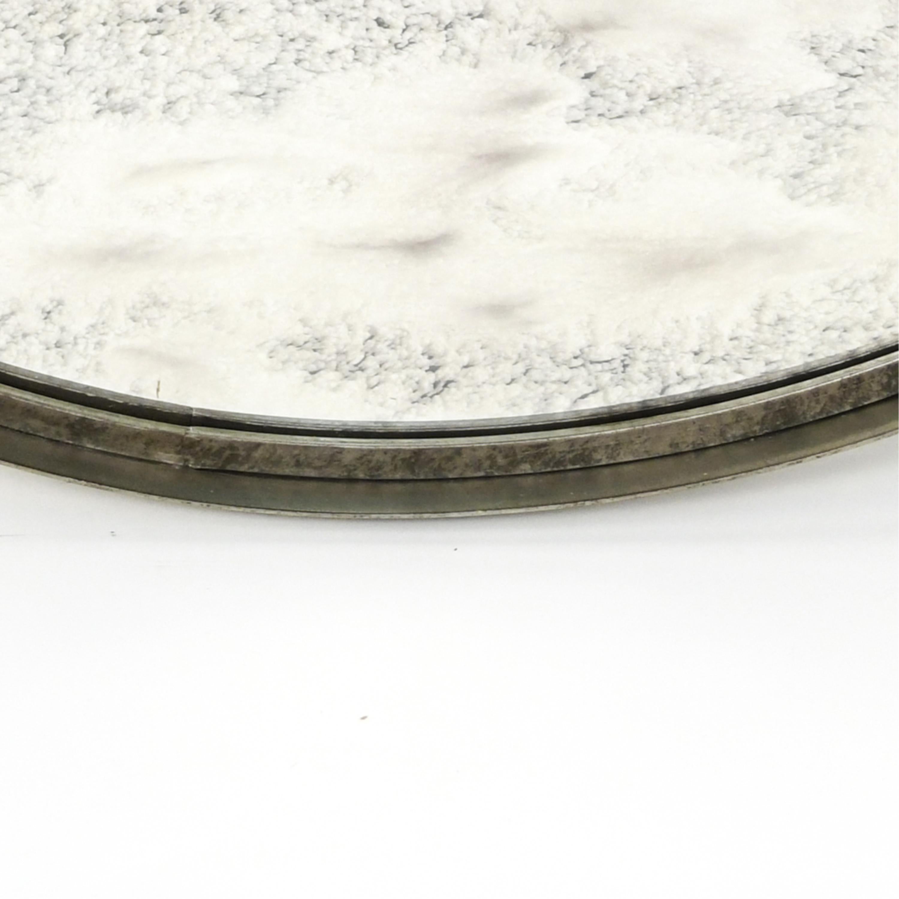 A Lorin Marsh Mid-Century Modern Minimalist enameled steel distressed round mirror
Dimensions: 40