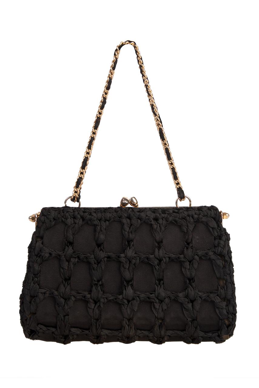 Superb 1970s woven shoulder or hand frame bag by Loris Azzaro.
 
LORIS AZZARO is particularly famous for his iconic crochet and chainmail pieces that he created during the late 1960s and 1970s, worn by women like Marisa Berenson, Jane Birkin, Raquel