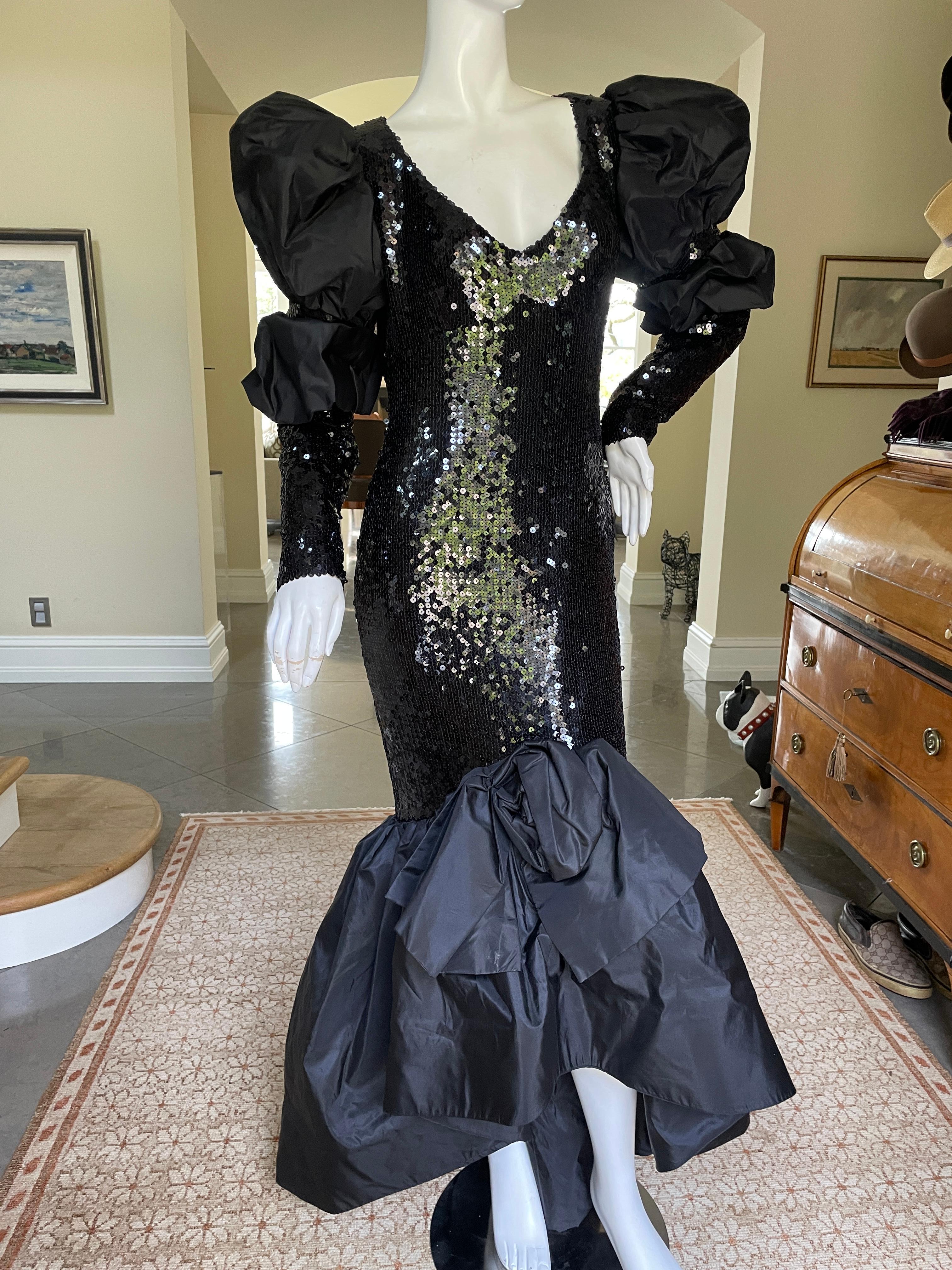 Loris Azzaro Couture Superb 1980's Black Sequin Mermaid Dress.
This is so wonderful, with bold shoulder sleeves and sequin arms, just amazing.
 No size tag, estimate French size 44
 Bust 36