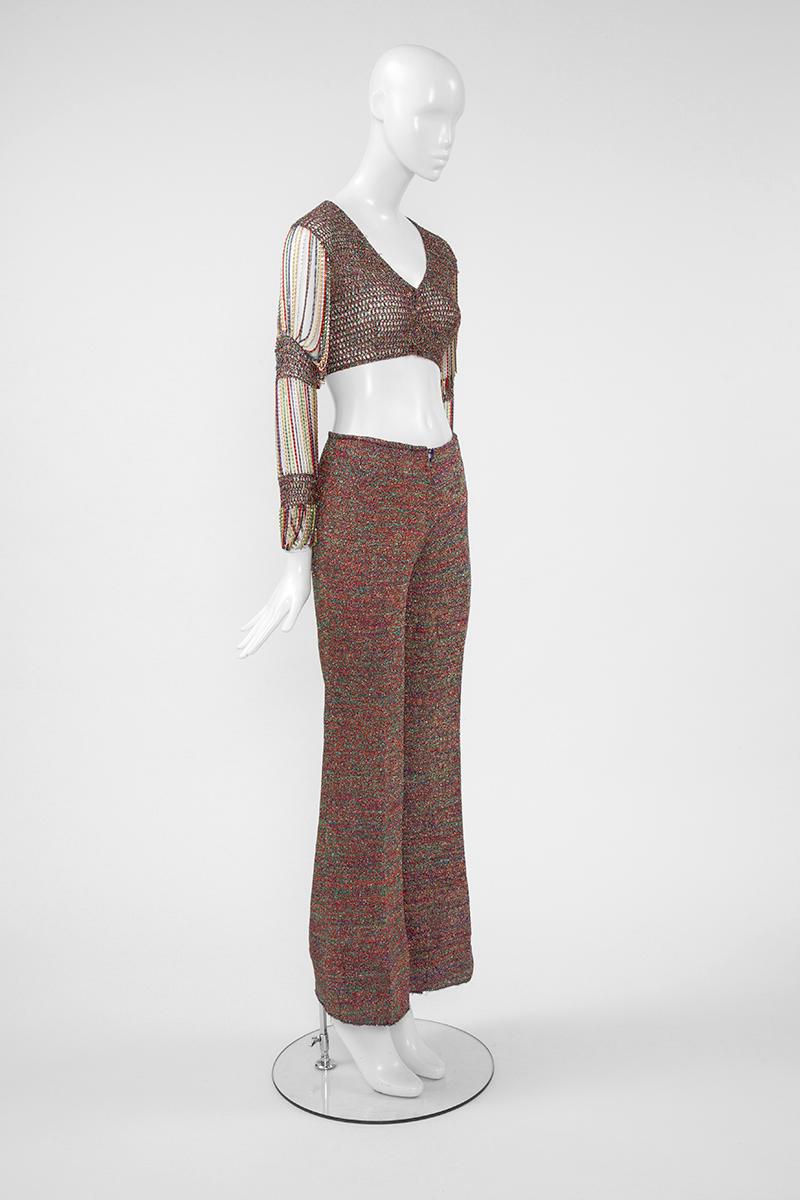 Favorite designer of Raquel Welch, Sophia Loren, Marisa Berenson, Claudia Cardinale or the French singer Dalida, Loris Azzaro defined the glamour of the 70’s. This outstanding and very rare 70's trousers ensemble is one of his several iconic and
