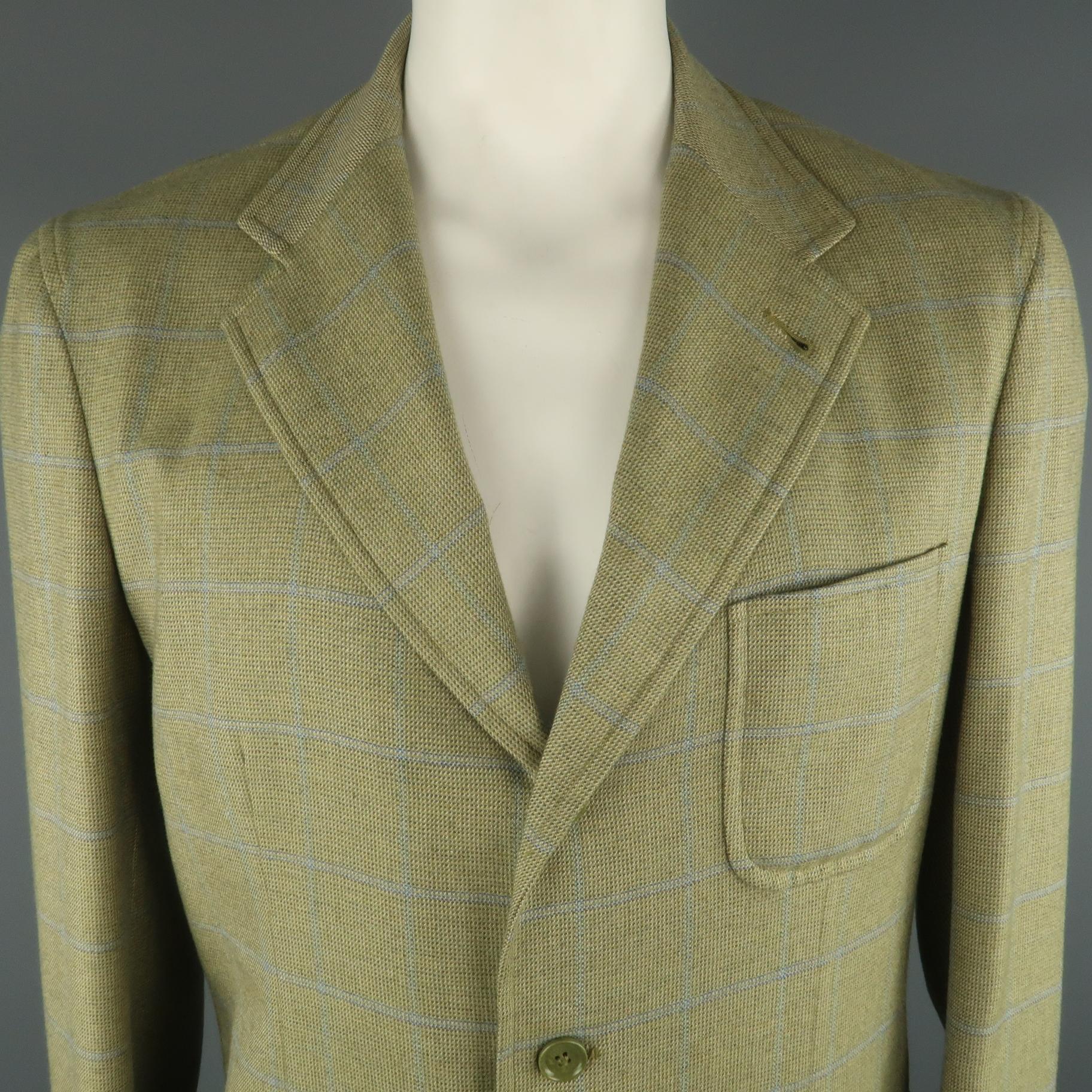LORO PIANA Sport Coat comes in green and blue tones in a plaid cashmere material, with a notch lapel, patch pockets, 3 buttons at closure, single breasted, double vent at back, unlined. Made in Italy.
 
Excellent  Pre-Owned Condition.
Marked: IT