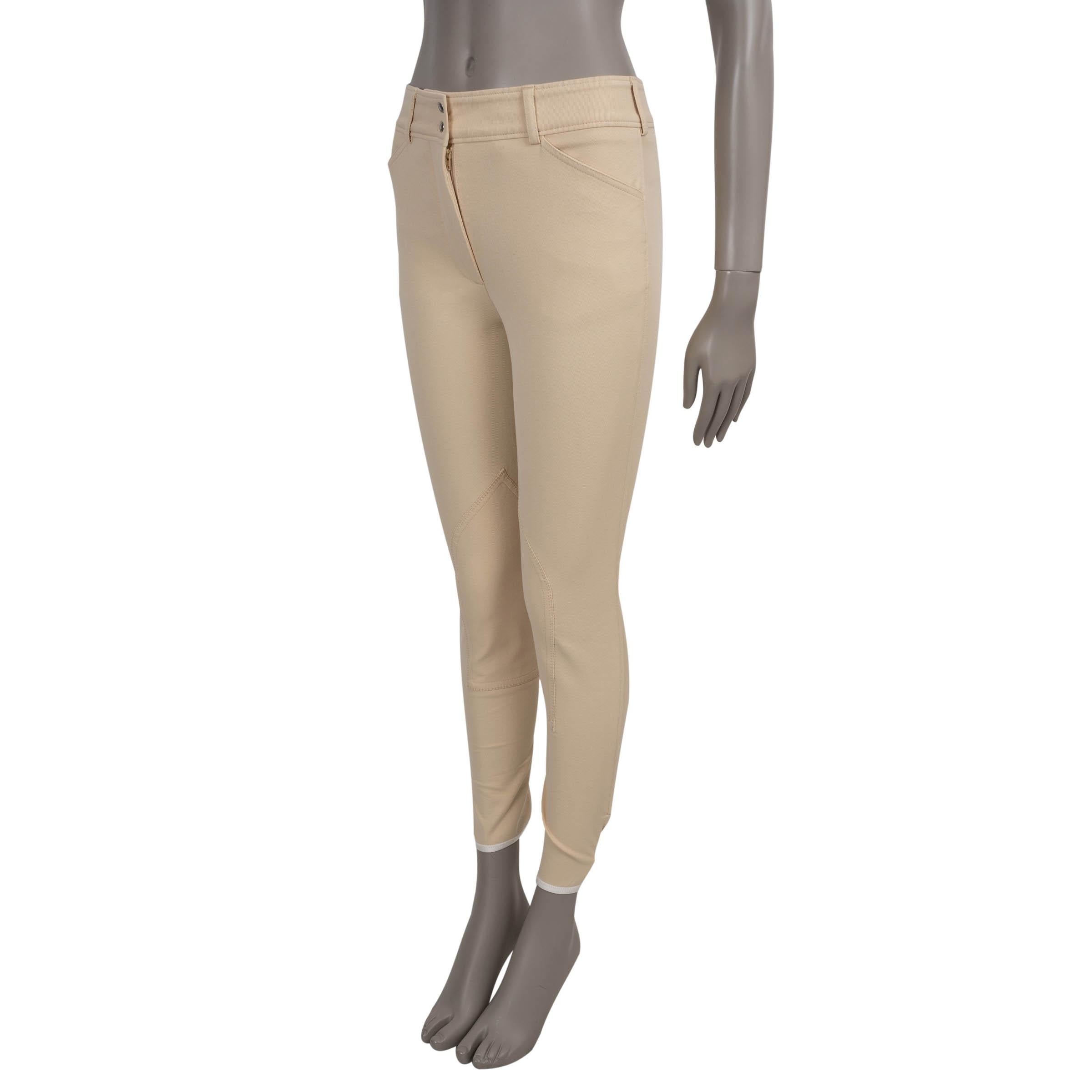 These 100% authentic Loro Piana Doris riding pants are crafted in stretch twill cotton (73%), polyamide (20%), and elastane (7%), offering both structure and flexibility. Designed with a high waist and slim legs, they feature classic equestrian