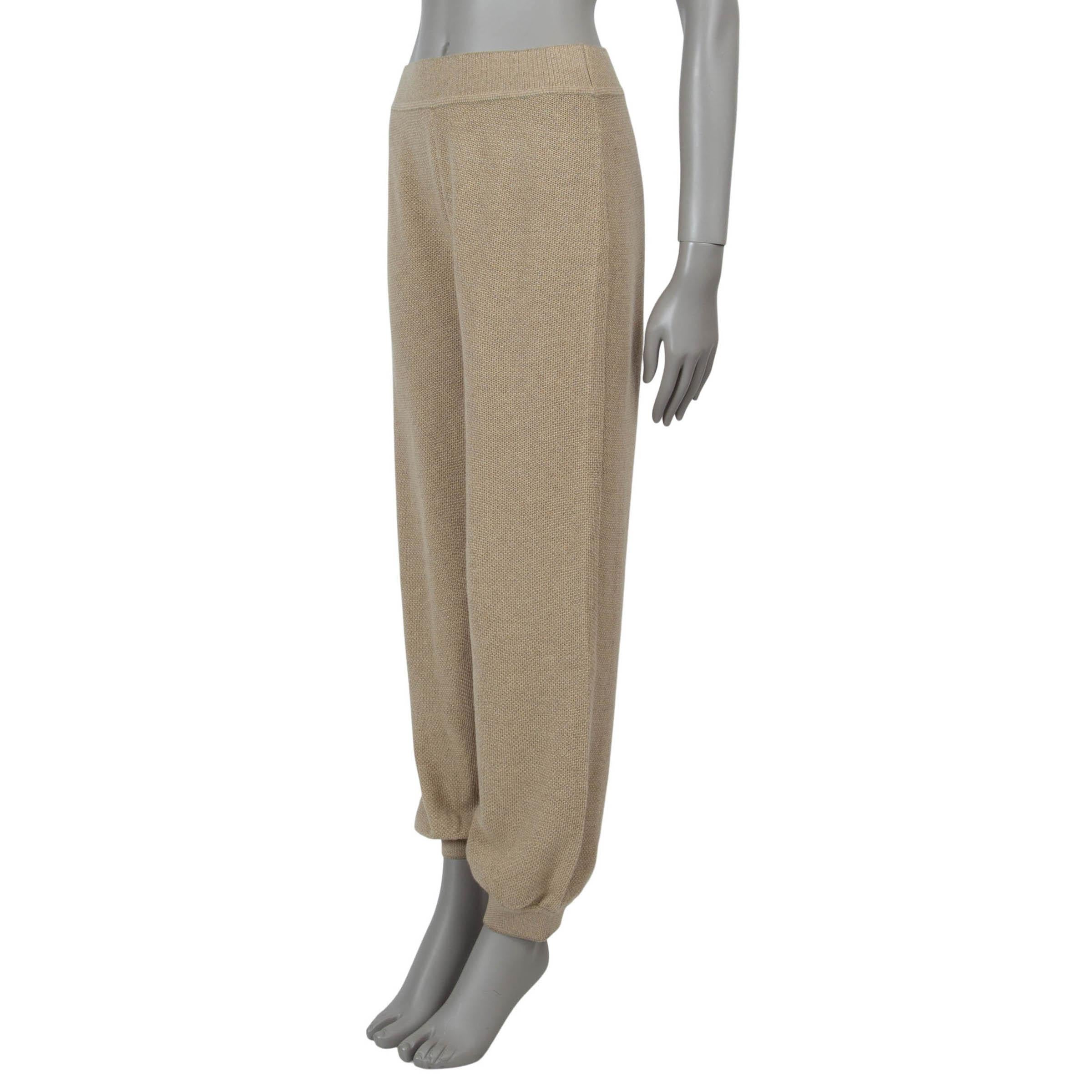 These 100% authentic Loro Piana track pants in beige honeycomb knit cashmere (100%) are the epitome of relaxed luxury. Featuring a high-waisted design with slouchy legs, rib-knit trims, and an elastic waistband, they deliver both style and comfort.