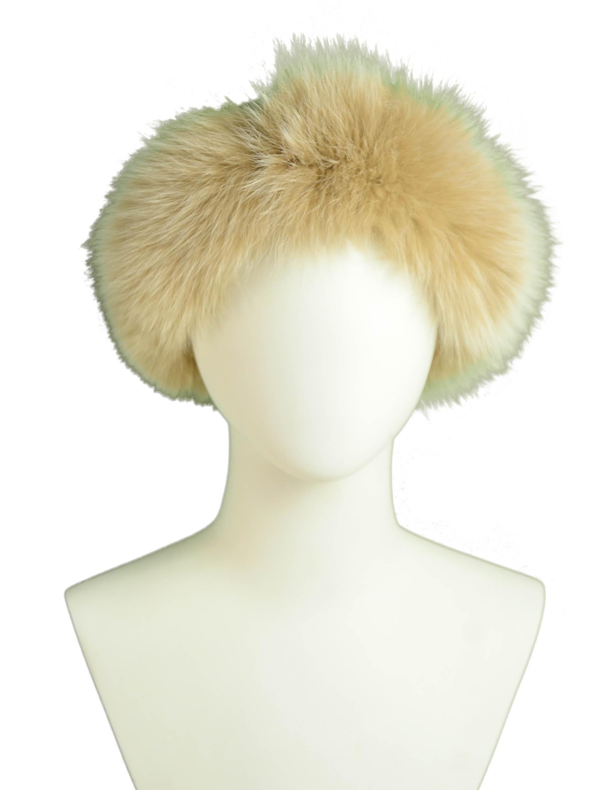 Loro Piana Beige Cashmere Knit Hat w/Fox Trim

Made In: Italy
Color: Beige
Materials: 100% Baby Cashmere, Fox
Overall Condition: Excellent

Measurements: 
20” Circumference (unstretched) x 8” High