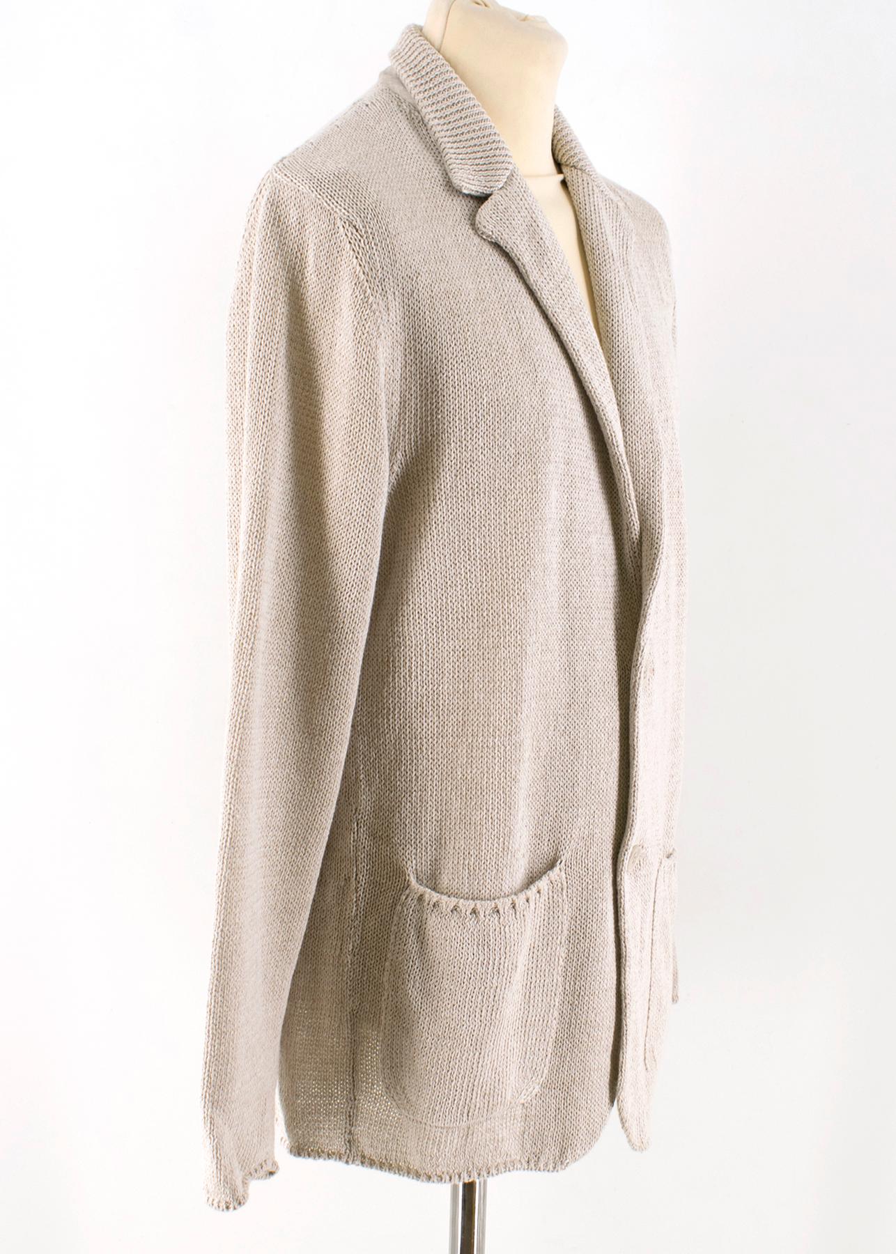Loro Piana Beige Knit Cardigan 

- Beige Knit Cardigan 
- Point collar 
- Button fastening closure at front 
- Dual front slip pockets

Please note, these items are pre-owned and may show some signs of storage, even when unworn and unused. This is