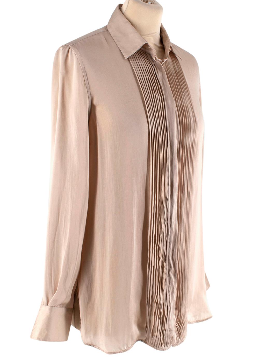 Loro Piana Beige Silk Satin Pleated Shirt

- Luxurious extra soft silk satin texture 
- Classic long sleeve cut 
- Gorgeous pleated details to the front 
- Neutral, easy to style creamy beige hue  
- Concealed button fastening to the front 
- Pleat