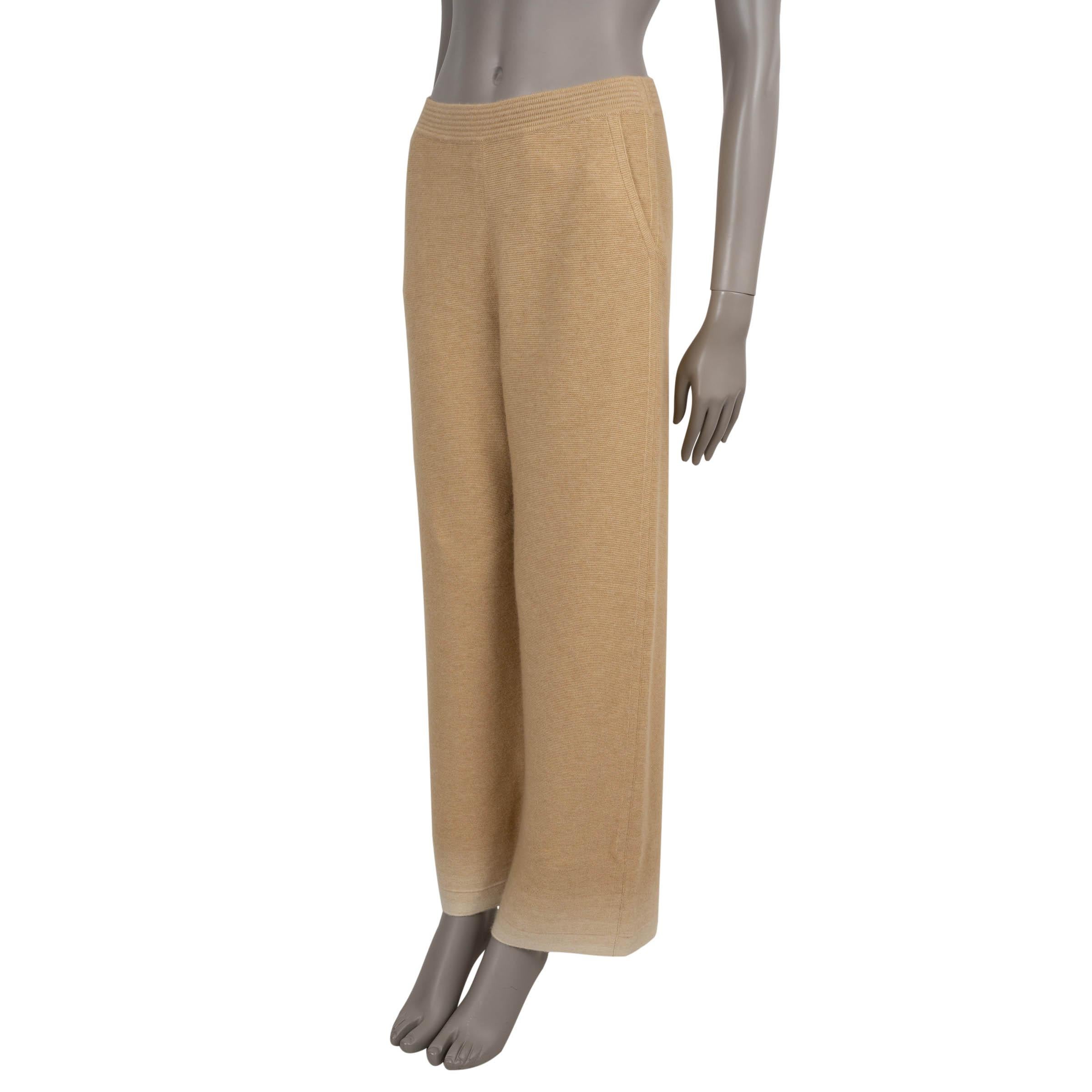 This 100% authentic Loro Piana track pants are crafted in gradient beige to cream double knit jersey cashmere (60%) and silk (40%). Designed with wide legs and a fluid drape, they feature two slant pockets for a touch of practicality. Complete the