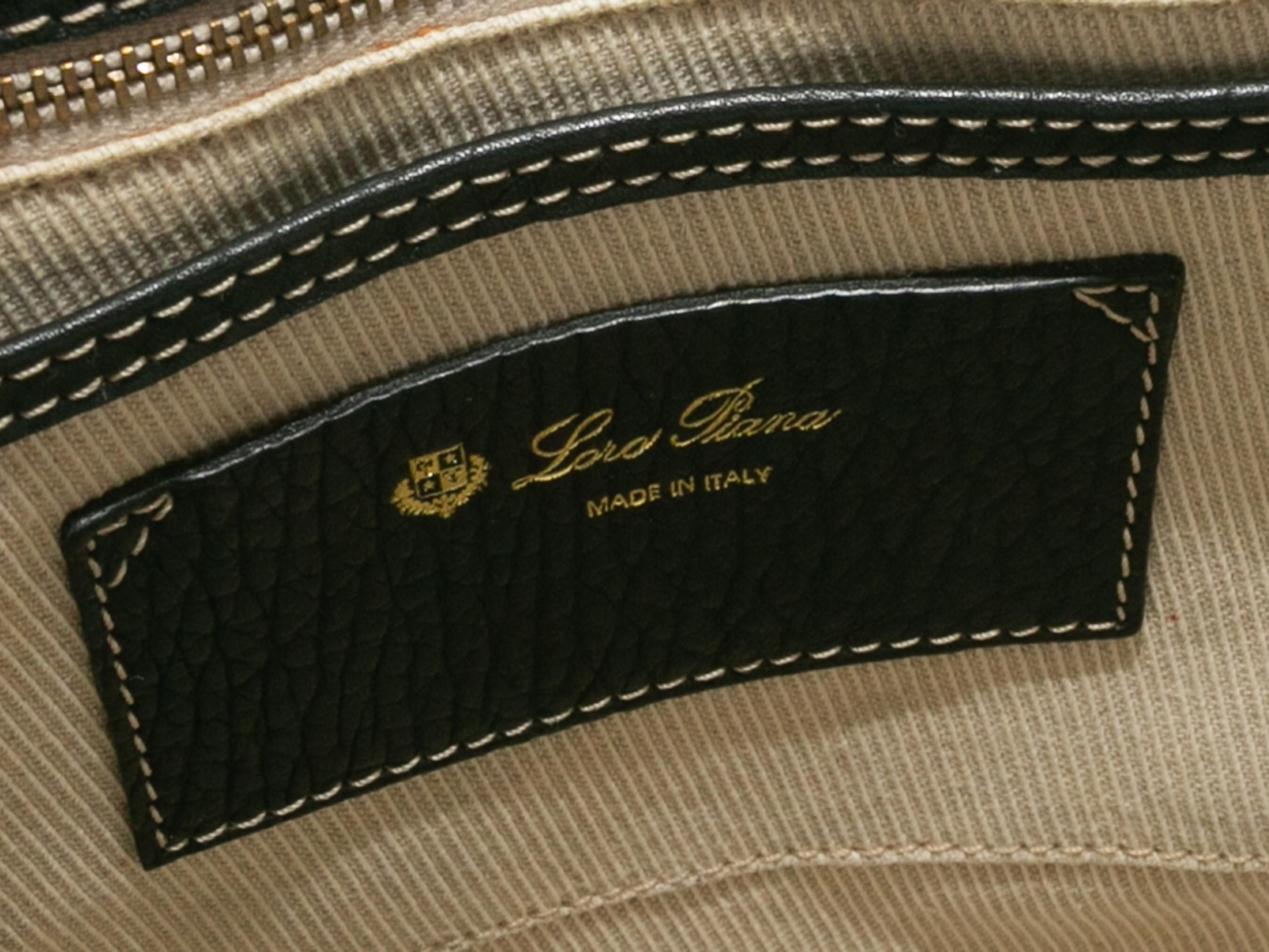 Product Details: Black Loro Piana Leather Handbag. This bag features a leather body, gold-tone hardware, dual rolled top handles, contrast stitching, and front clasp closure. 11.5