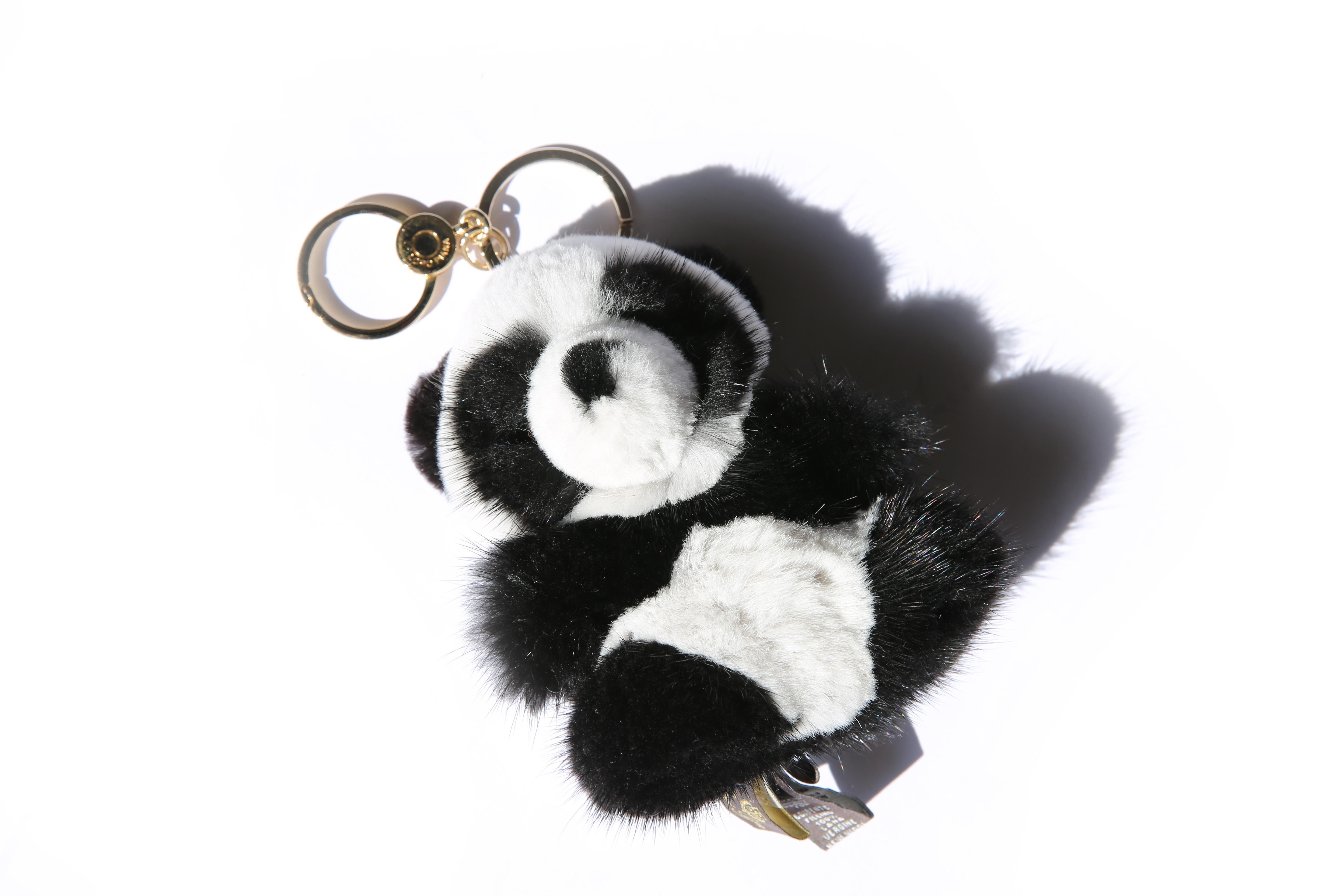 Loro Piana black and white panda keychain or bag fob in rabbit fur
Gold hardware
Engraved Loro Piana

SHIPPING - Due to the low item cost of this item, if you would like more cost effective shipping please contact me BEFORE PURCHASE. Direct options
