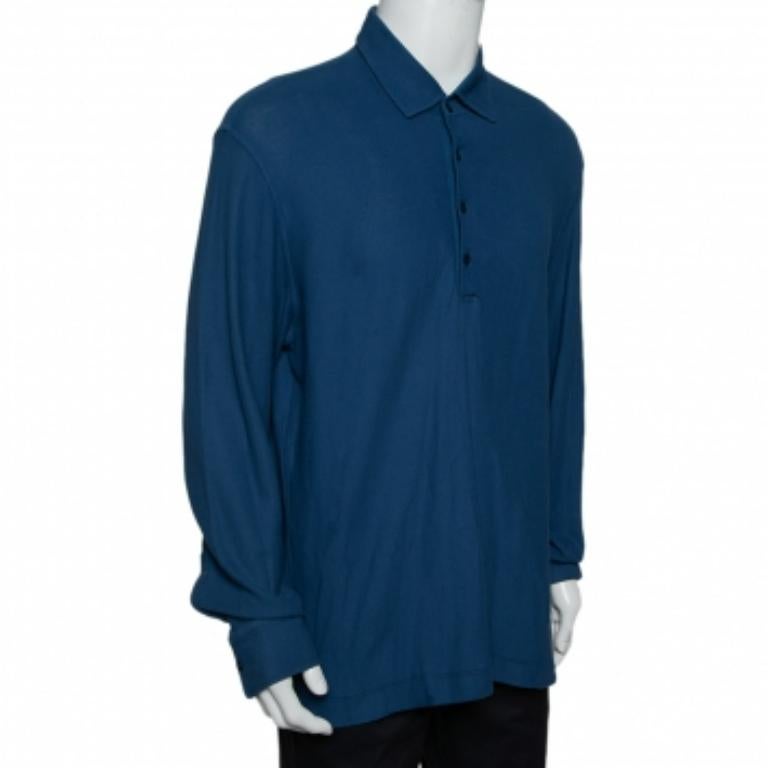 This blue polo t-shirt from Loro Piana will look amazing on you! It is made of cotton and features a relaxed silhouette. It comes with classic collars and button fastenings and long sleeves. It will look best with casual jeans and sneakers.