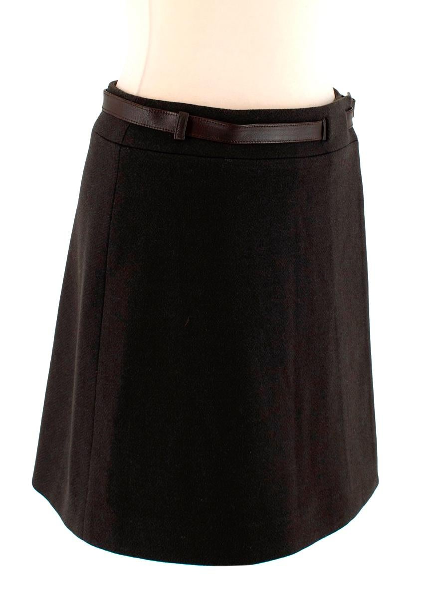 Loro Piana Brown Cashmere blend Wrap Belted Mini Skirt

-Luxurious soft cashmere texture 
-Classic wrap style 
-Waist leather belt 
-Fully lined 
-Pressure button fastening to the front 
-Branded horn buckle 
-Branded hardware to the front