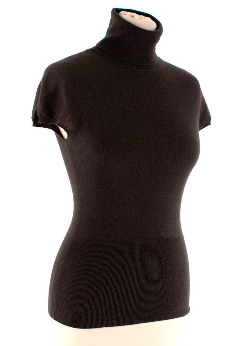 Loro Piana Brown Cashmere Sleeveless Turtleneck Sweater 

-Luxurious soft cashmere texture
-Classic timeless style 
-Neutral dark brown hue 
-Turtle neck sleeveless design 
-Golden Branded hardware to the front 
-Ribbed neck and waist 
-Perfect for