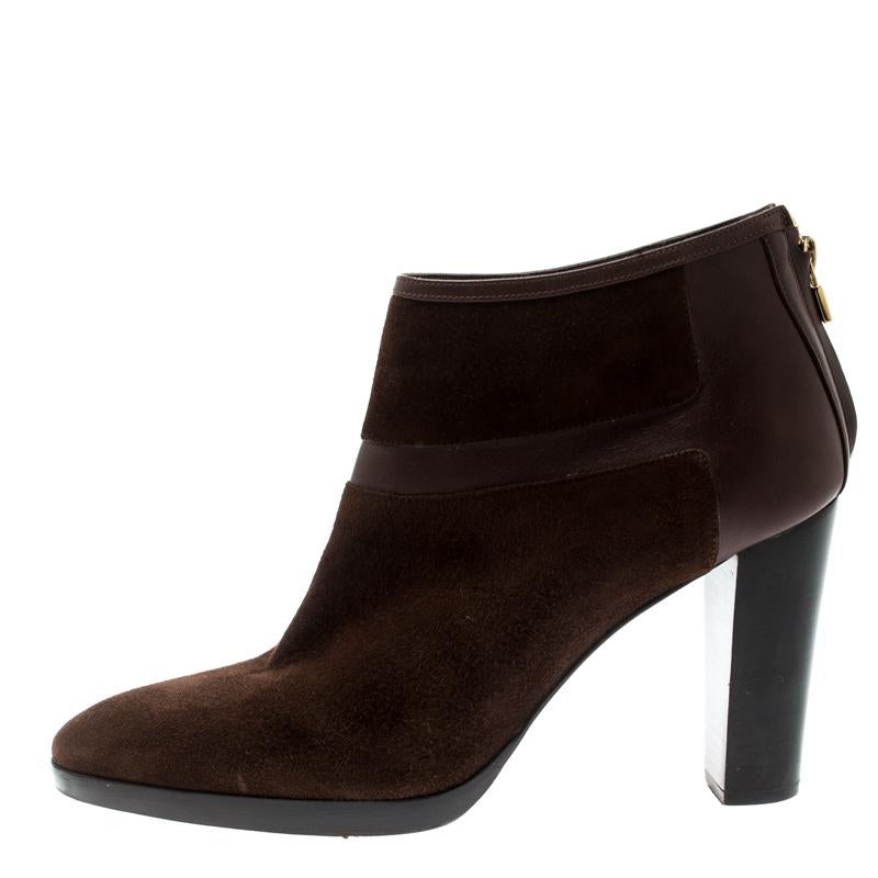 Enjoy countless days of high-fashion in these ankle boots from the house of Loro Piana. They come covered in suede and leather and designed with back zippers, leather insoles, and 10 cm heels.

