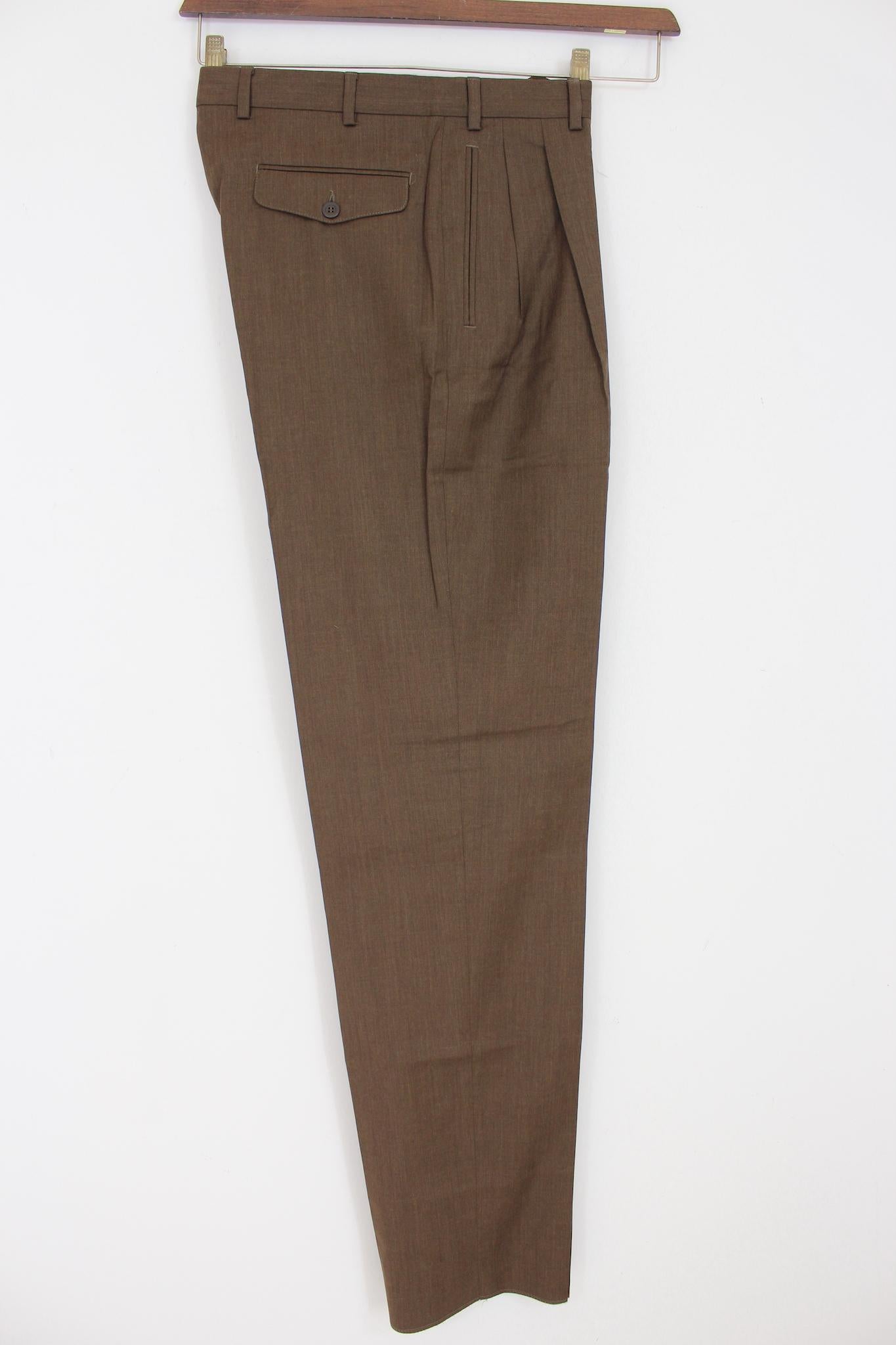 Loro Piana classic vintage 90s trousers. Brown color, 100% Tasmanian wool. Made in Italy. Coming from stock fund.

Size: 48 It 38 Us 38 Uk

Waist: 41 cm
Length: 120 cm
Hem: 21 cm
Pant crotch: 94 cm