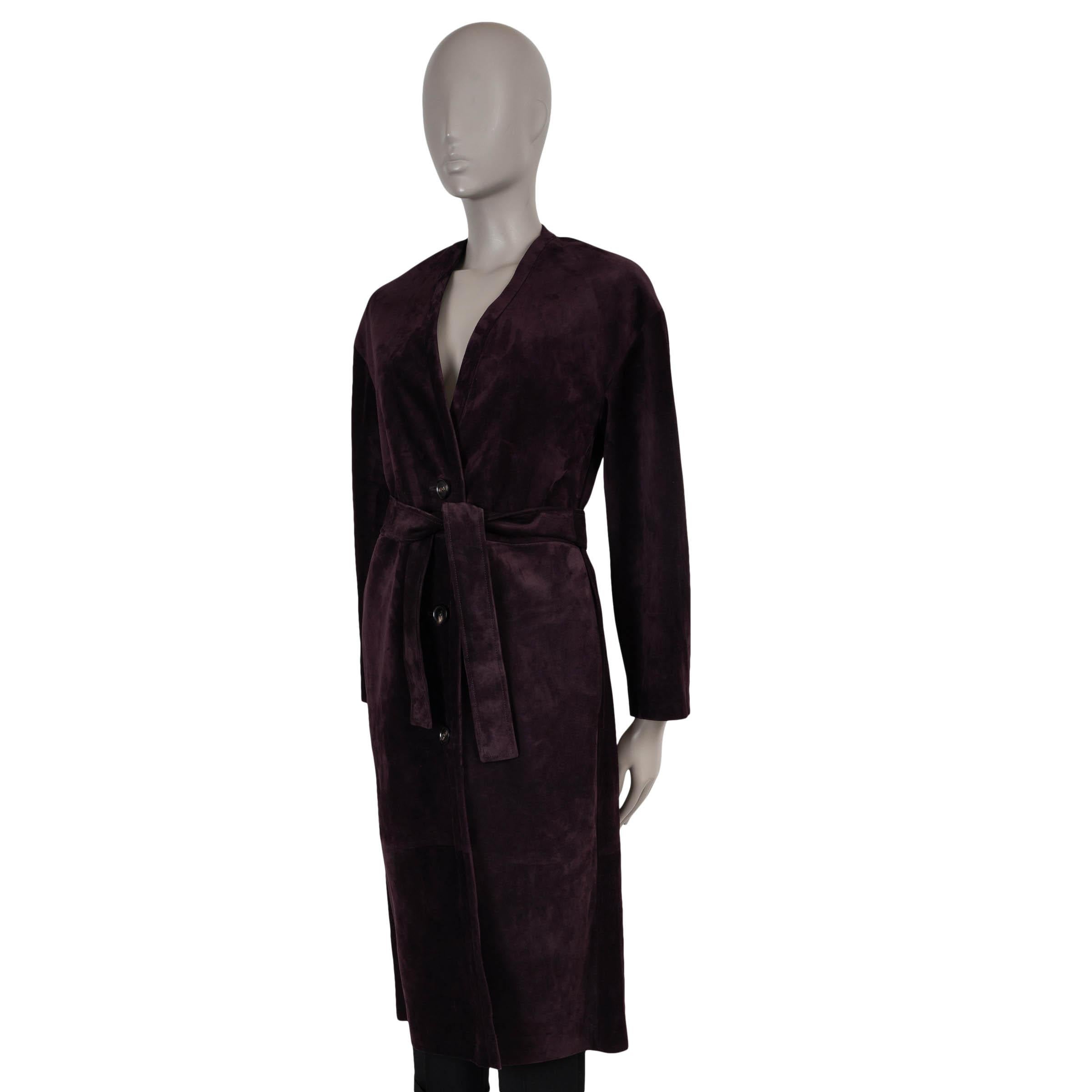 This 100% authentic Loro Piana Peter coat is crafted in deep burgundy suede and cut in a relaxed silhouette that cinches at the waist with a matching buckled suede belt, detailed with tonal rows of stitching. It features a clean V-neckline, two side