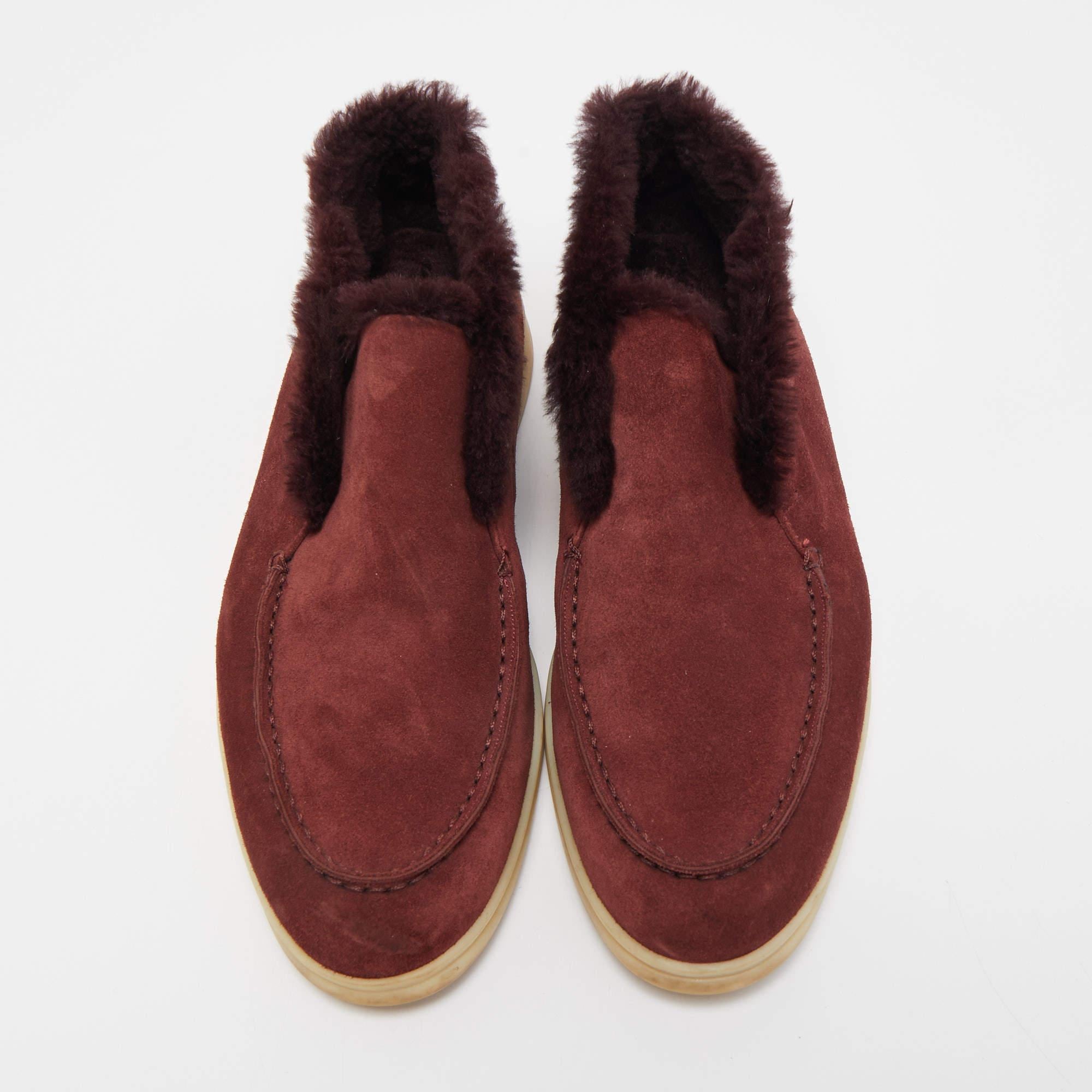 Bringing together comfort and style are these Open Walk Chukka boots from Loro Piana! The burgundy boots are crafted from suede and styled with fur.

