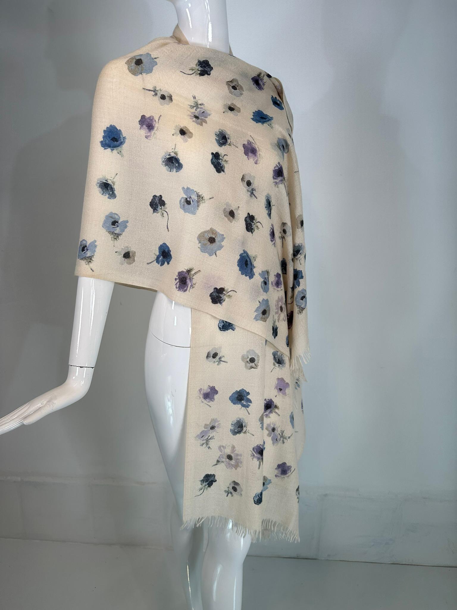 Loro Piana cashmere & silk blue & cream foral fringe hem shawl/stole. Beautiful light open weave shawl scattered with flowers in soft blues, lavender, green & pale gold. Long oblong shape with fringe on either end. 
70% cashmere 30% silk. 
In