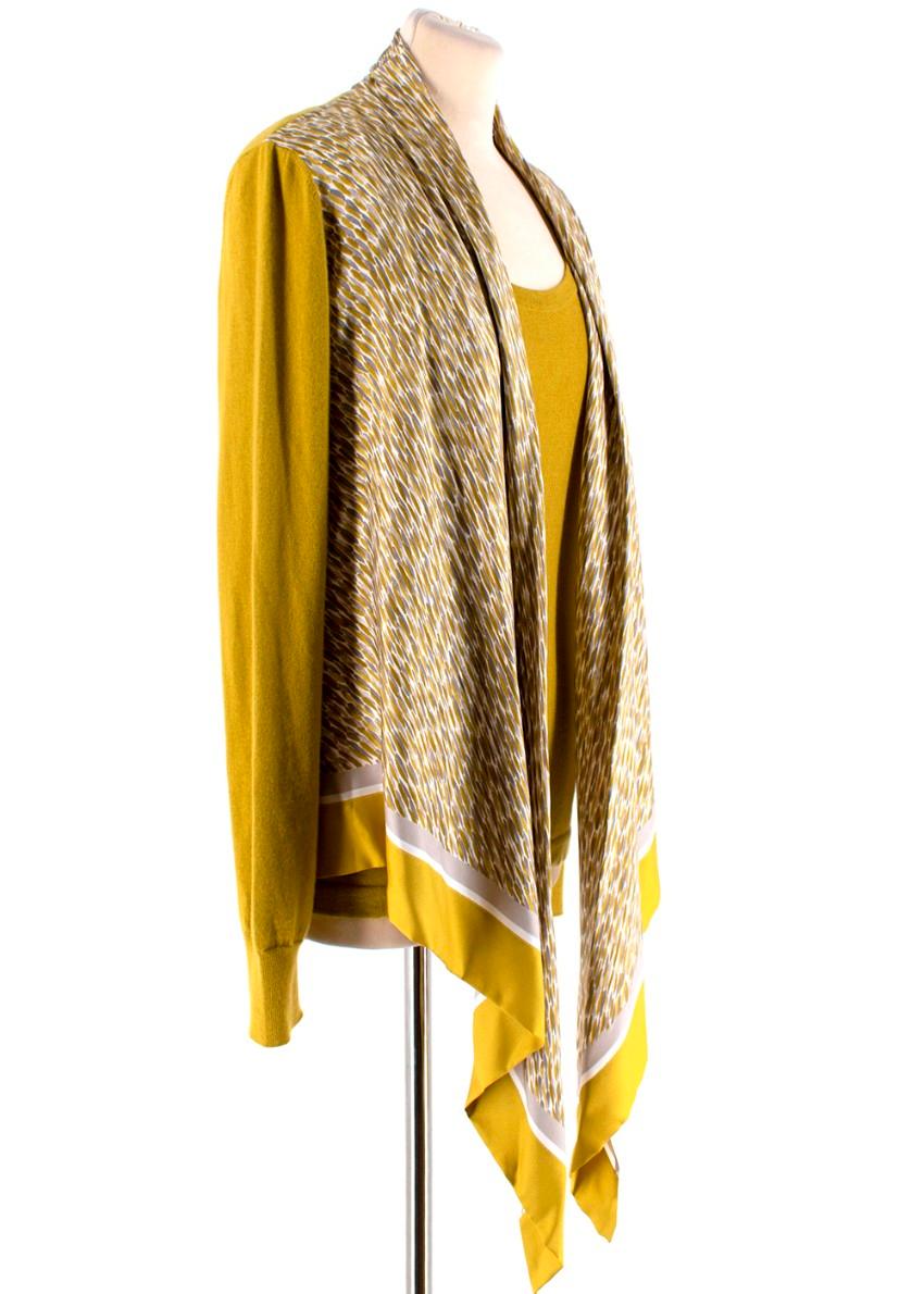 Loro Piana Chartreuse Cashmere Scarf Detail Twin-Set

Top:
- Scoop neck 
- Ribbed bottom 
- Soft, stretchy fabric 

Cardigan:
- Silk multi-coloured patterned front 
- Ribbed cuffs and bottom 
- Soft, stretchy fabric 

Materials:
Top:
- 100%