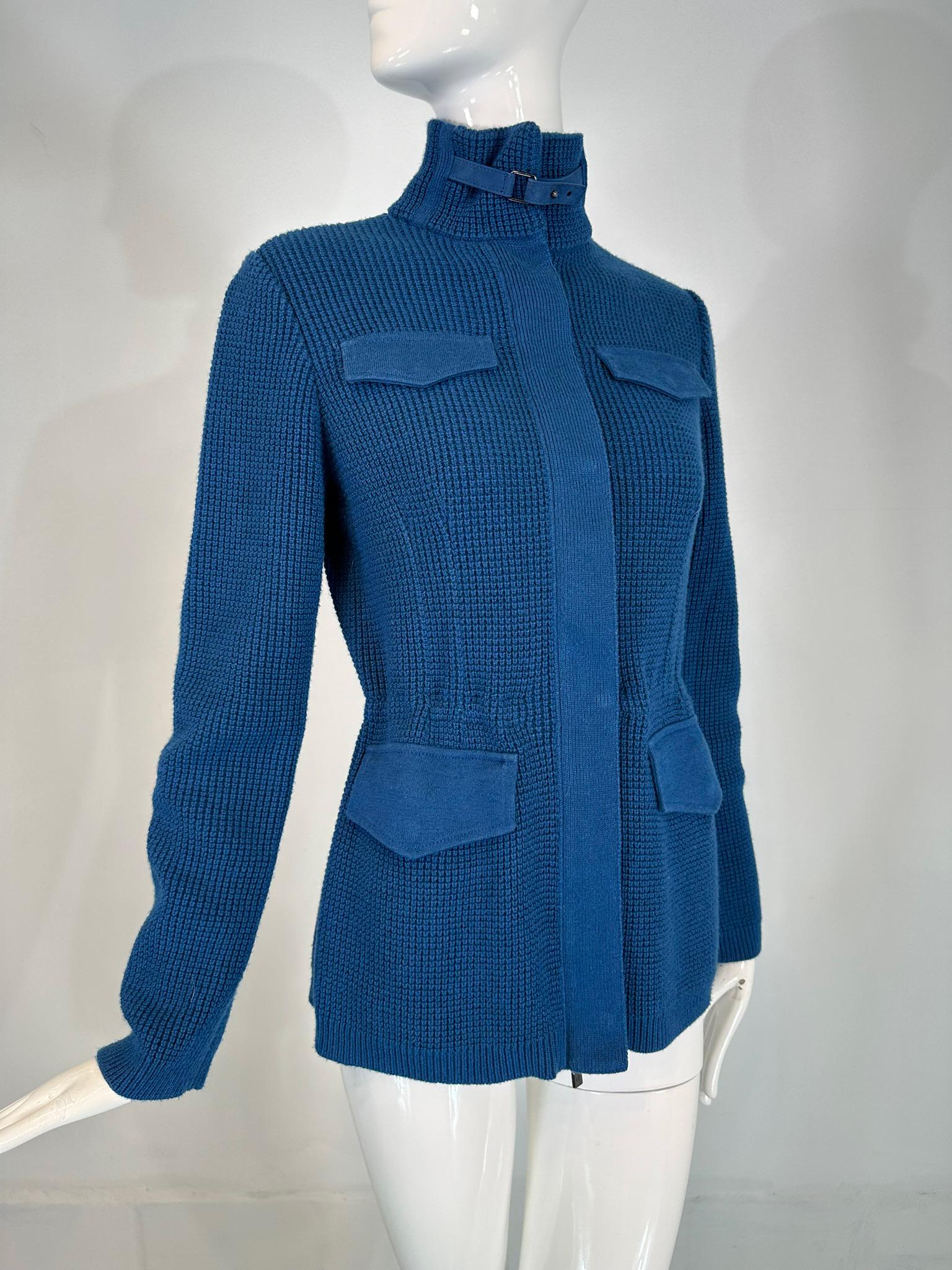 Loro Piana chunky knit, marine blue, cashmere, linen & silk cardigan sweater, size small. High neck collar with a blue suede buckle strap, Long sleeve sweater with placket front facing, 4 working flap pockets, each knitted on the outside, suede