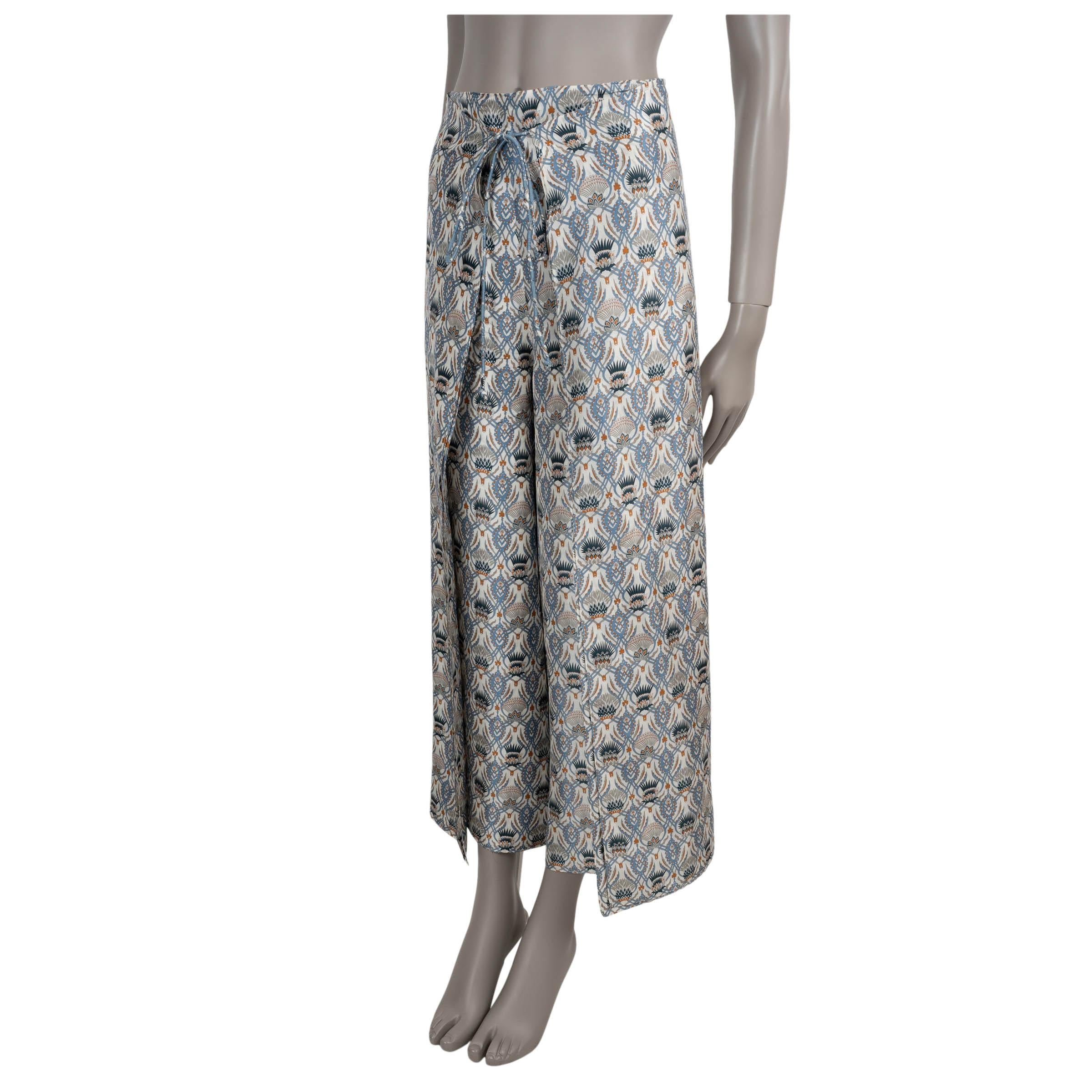 These 100% authentic Loro Piana Maynard pants are crafted in lightweight shantung silk featuring in chalk and Deep Lagoon Water Blue Cardo Veneziano motif. With a lustrous sheen and naturally irregular texture evocative of fine tapestry, they are