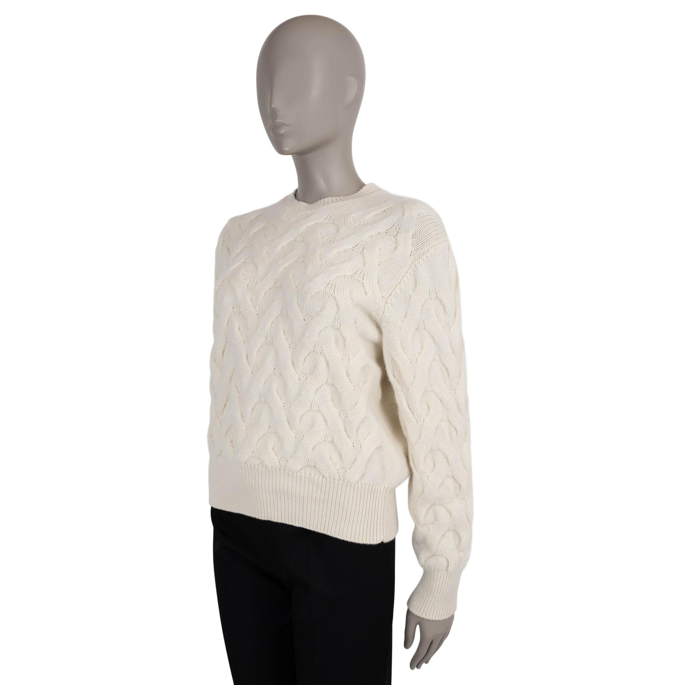 This 100% authentic Loro Piana sweater is crafted in cream cable-knit cashmere for exceptional softness and warmth. It features a relaxed fit with dropped shoulders, a classic crewneck, and rib-knit trims for a refined finish. A timeless essential