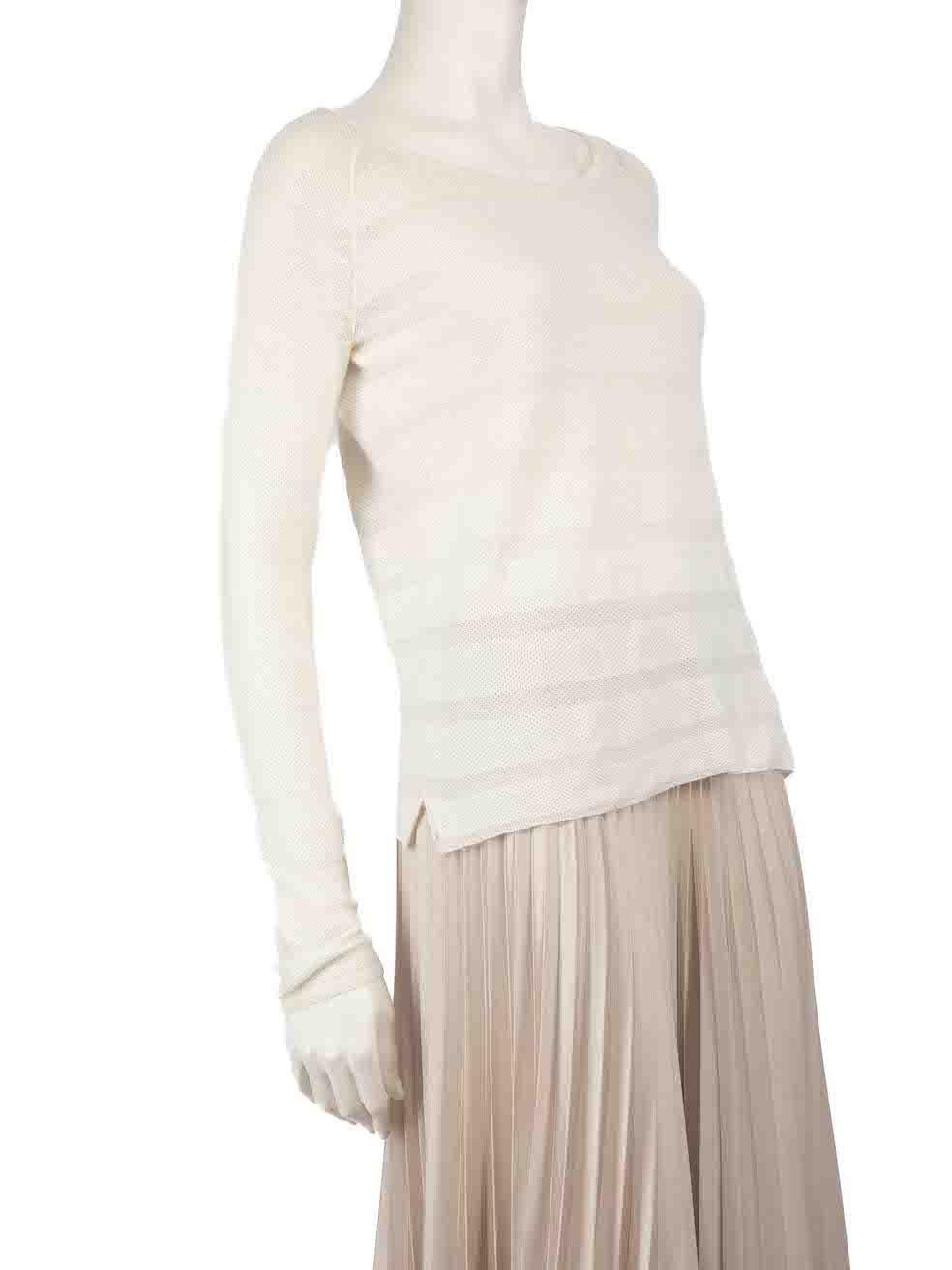 CONDITION is Very good. Minimal wear to jumper is evident. Minimal pilling to overall material as well as pull thread to knit on the front and left sleeve on this used Loro Piana designer resale item.
 
 
 
 Details
 
 
 Cream
 
 Cashmere
 
 Knit