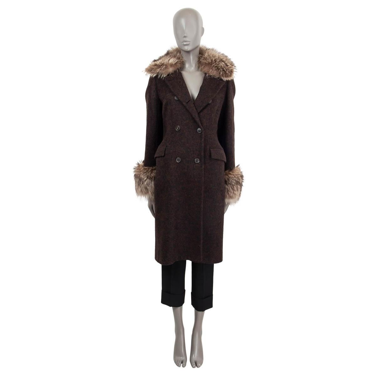 100% authentic Loro Piana double breasted coat in brown and black alpaca (95%) and nylon (5%). Features two flap pockets on the front, a detachable raccoon fur collar and detachable cuffs. Lined in cupro (100%). Has been worn and is in excellent