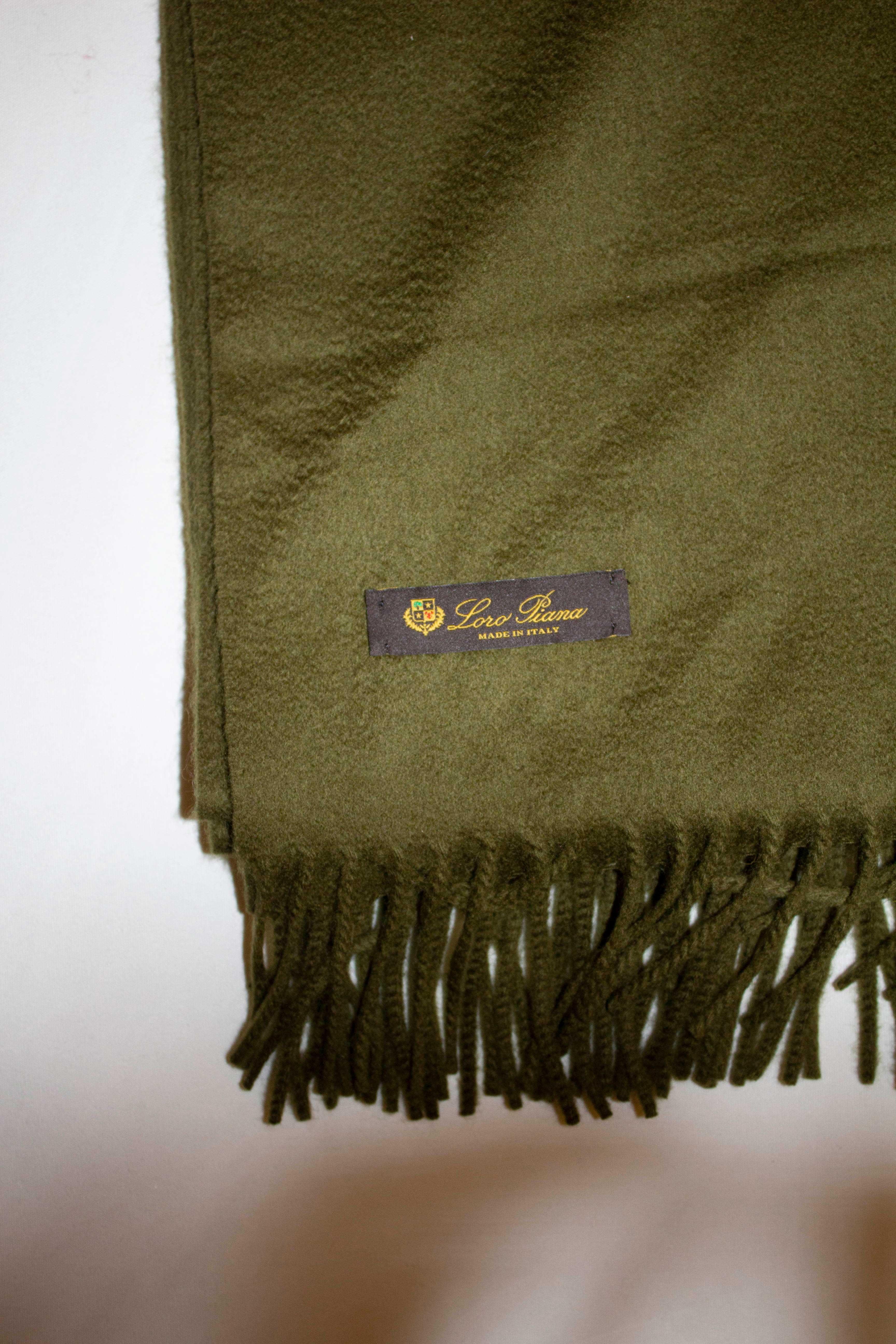 A super soft , 100 % cashmere scarf by Loro Piana. In a glorious green colour , the scarf measures 68'' x 18'' .  Made in Italy.