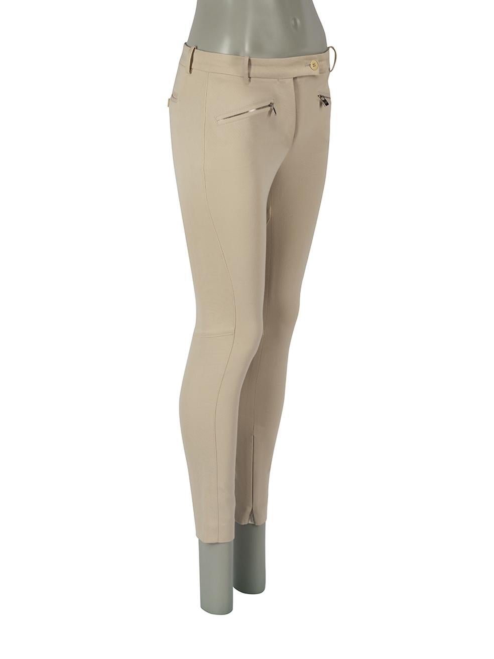 CONDITION is Good. Minor wear to trousers is evident. Light wear to fabric surface with one or two small discoloured marks found through the front leg on this used Loro Piana designer resale item.
 
 Details
 Ecru
 Cotton
 Skinny trousers
 Mid rise
