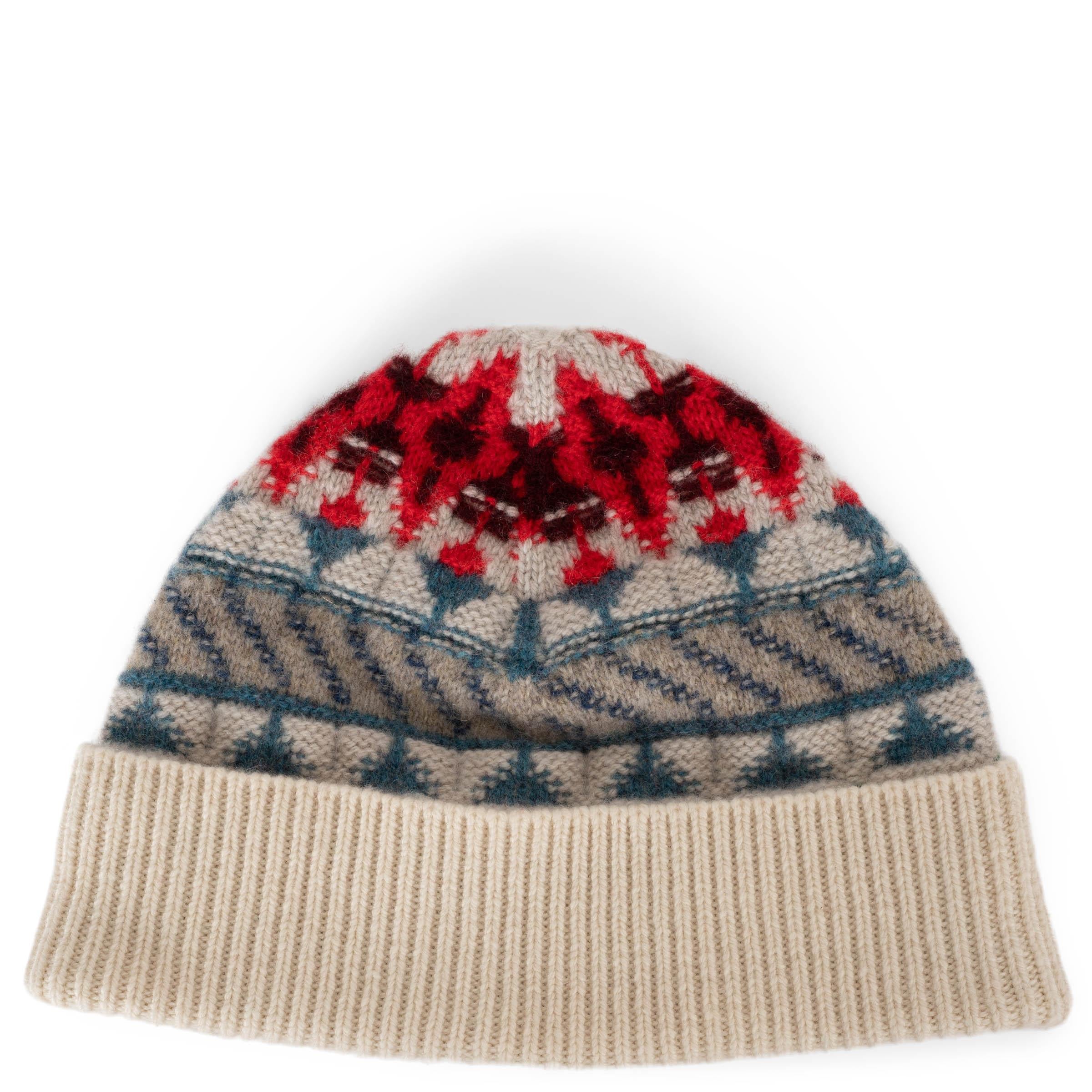 This 100% authentic Loro Piana Holiday Noel beanie in cream, red, blue, and green knit cashmere (100%) is a cozy and festive accessory. Perfect for the colder months, it pairs beautifully with the matching bomber and shorts available in separate