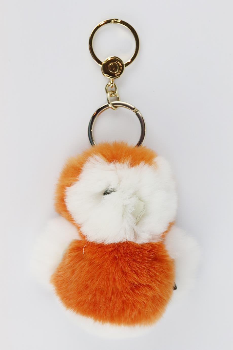 Loro Piana fur bag charm. Orange and white. Does not come with dustbag or box. Height: 4 in. Width: 2.5 in
