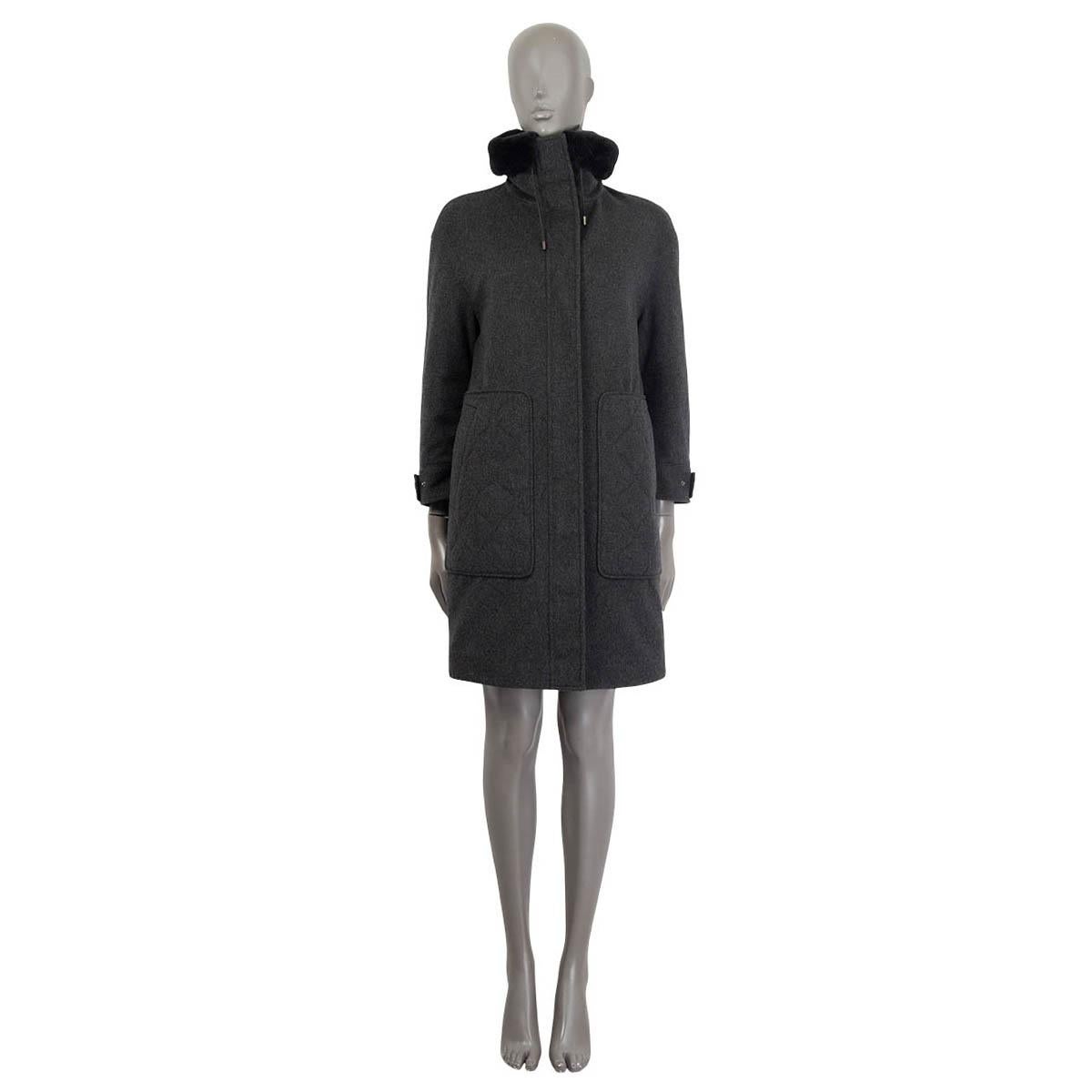 100% authentic Loro Piana storm system coat in charcoal cashmere (100%). Features a fur collar, buttoned cuffs and two slit pockets on the front. Opens with push buttons, a drawstring and a concealed zipper at the front. Lined in green nylon (100%).