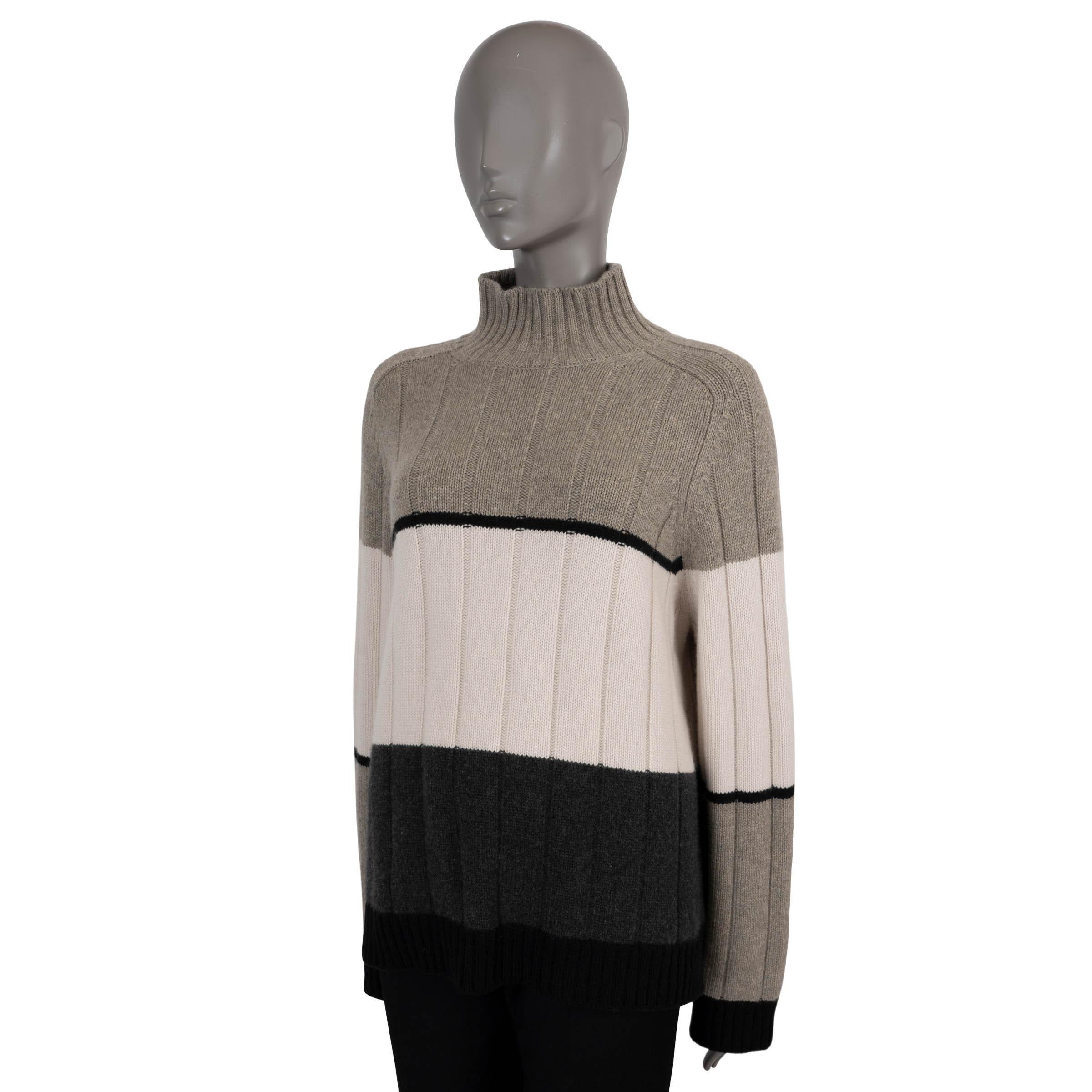 100% authentic Loro Piana Duca d'Aosta turtleneck sweater in light and dark grey, black and white colorblock stripe-knit baby cashmere (100%). Unlined. Has been worn and is in excellent condition.

Measurements
Model	FAL7027
Tag